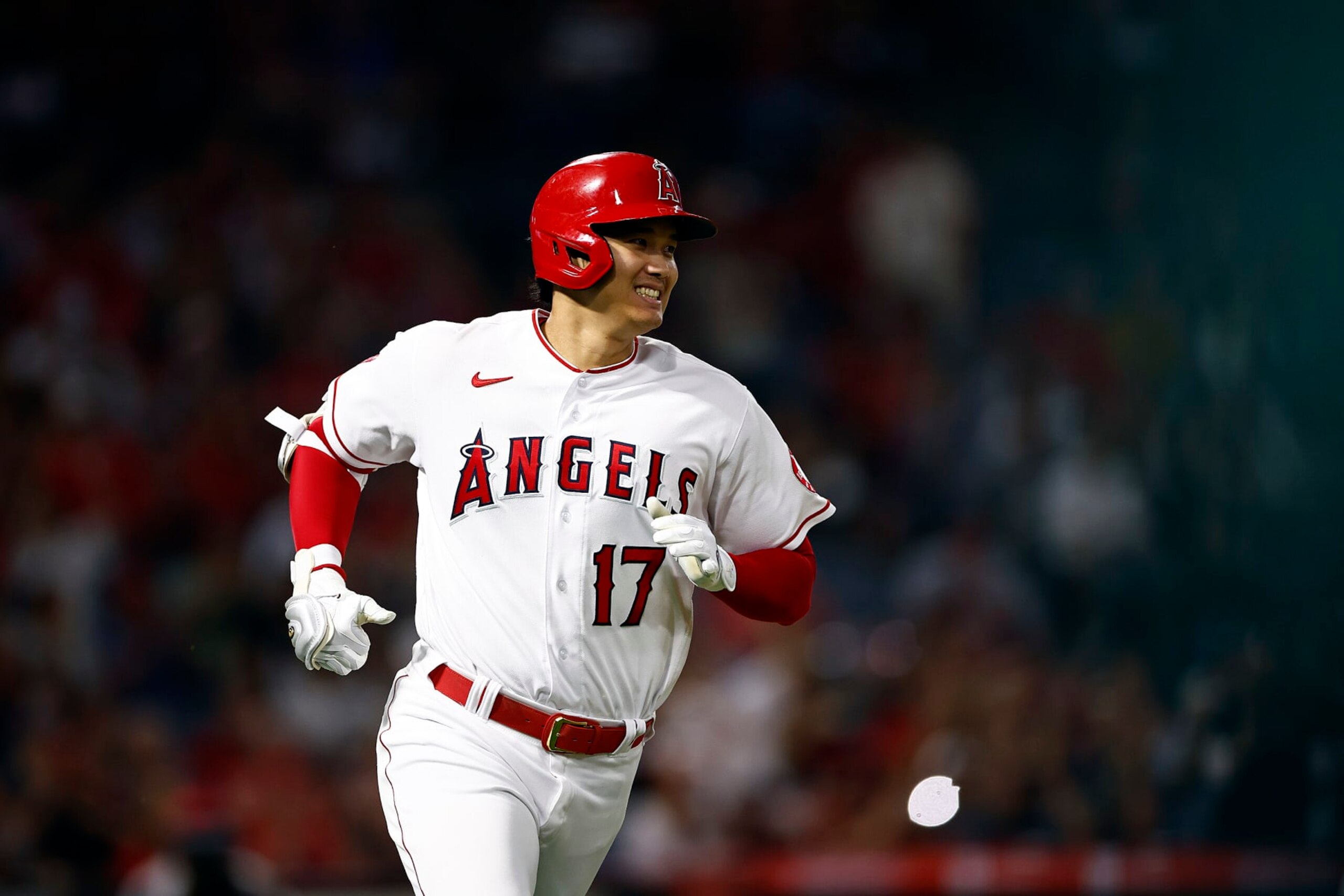 ANAHEIM, CALIFORNIA - SEPTEMBER 28:  Shohei Ohtani #17 of the Los Angeles Angels singles against the Oakland Athletics in the fourth inning at Angel Stadium of Anaheim on September 28, 2022 in Anaheim, California. (Photo by Ronald Martinez/Getty Images)