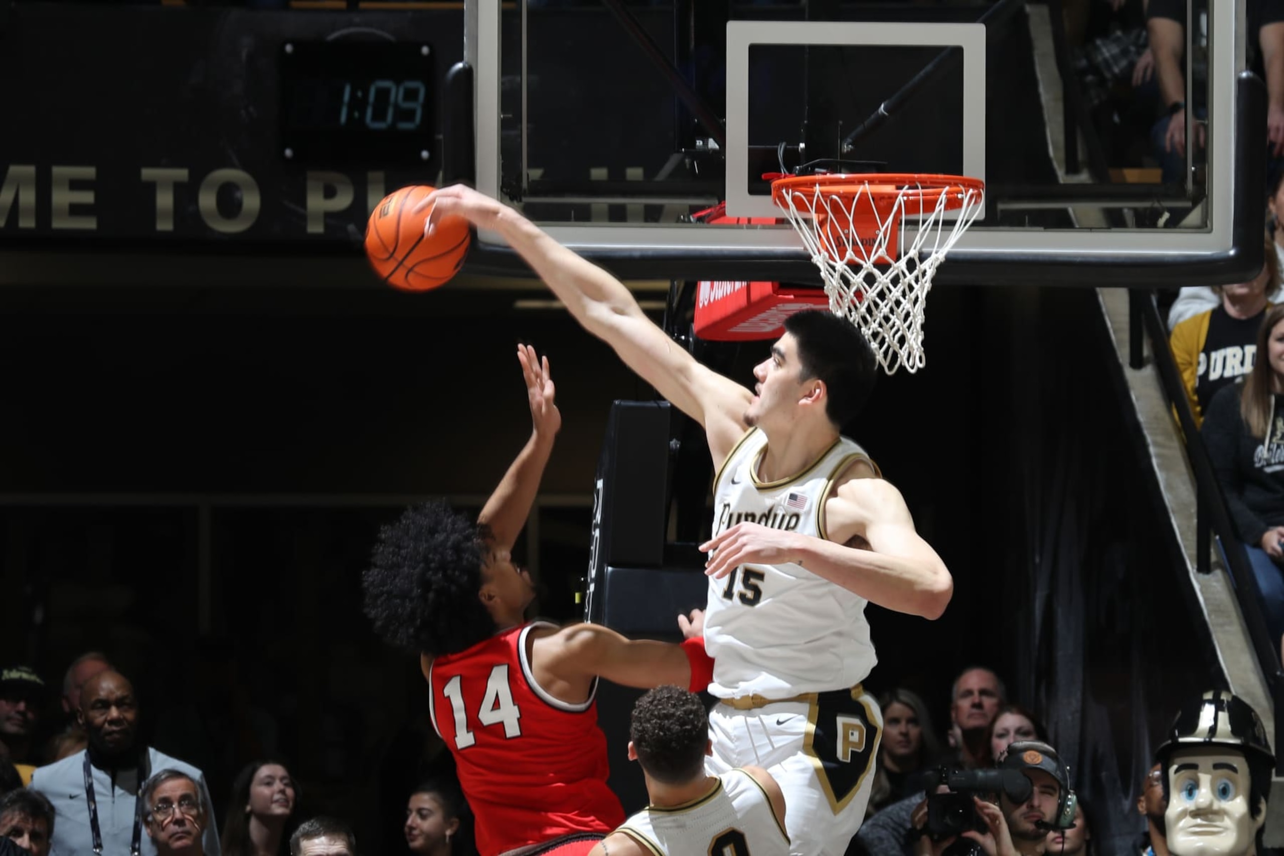 WEST LAFAYETTE, IN - FEB 19: Ohio State Buckeyes forward Justice Sueing (14) has his shot blocked by Purdue Boilermakers center Zach Edey (15) on February 19, 2023, at Mackey Arena in West Lafayette, Indiana. (Photo by Brian Spurlock/Icon Sportswire via Getty Images)