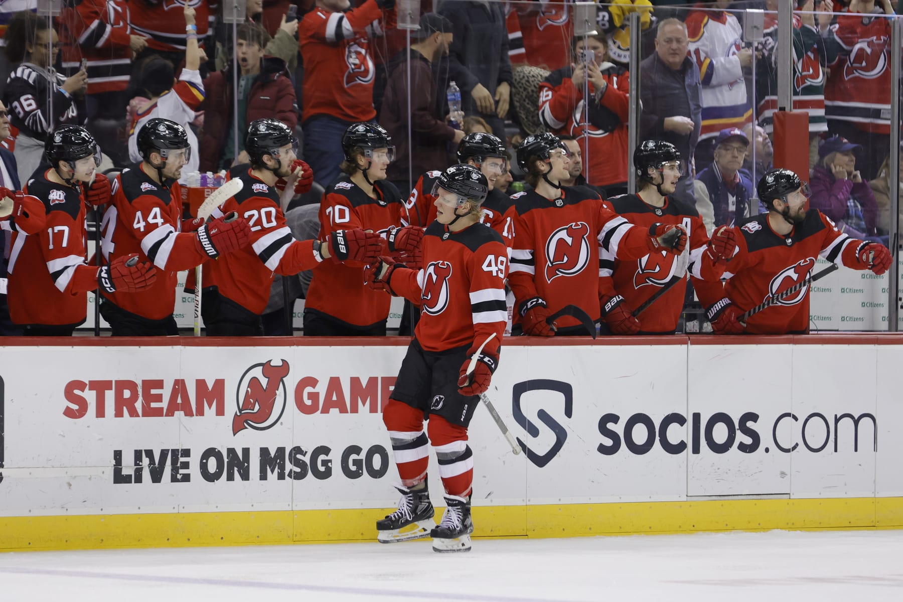 NEWARK, NEW JERSEY - FEBRUARY 19: Fabian Zetterlund #49 of the New Jersey Devils celebrates with teammates after scoring a goal against the Winnipeg Jets during the third period at Prudential Center on February 19, 2023 in Newark, New Jersey. (Photo by Josh Lobel/NHLI via Getty Images)