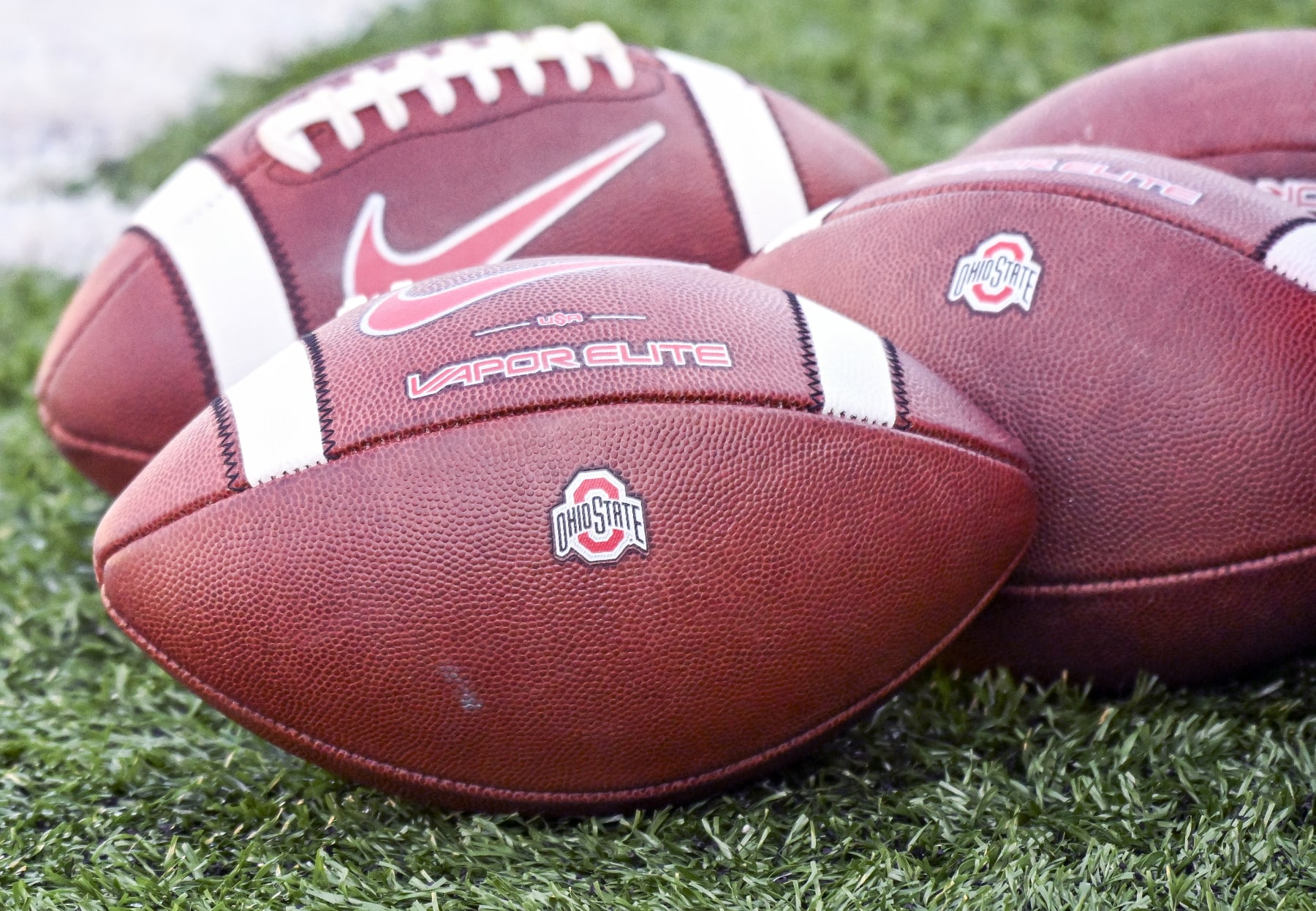 COLLEGE PARK, MD - NOVEMBER 19: Ohio State Buckeyes footballs sit on the sidelines during the Ohio State Buckeyes game versus the Maryland Terrapins on November 19, 2022 at SECU Stadium in College Park, MD.  (Photo by Mark Goldman/Icon Sportswire via Getty Images)