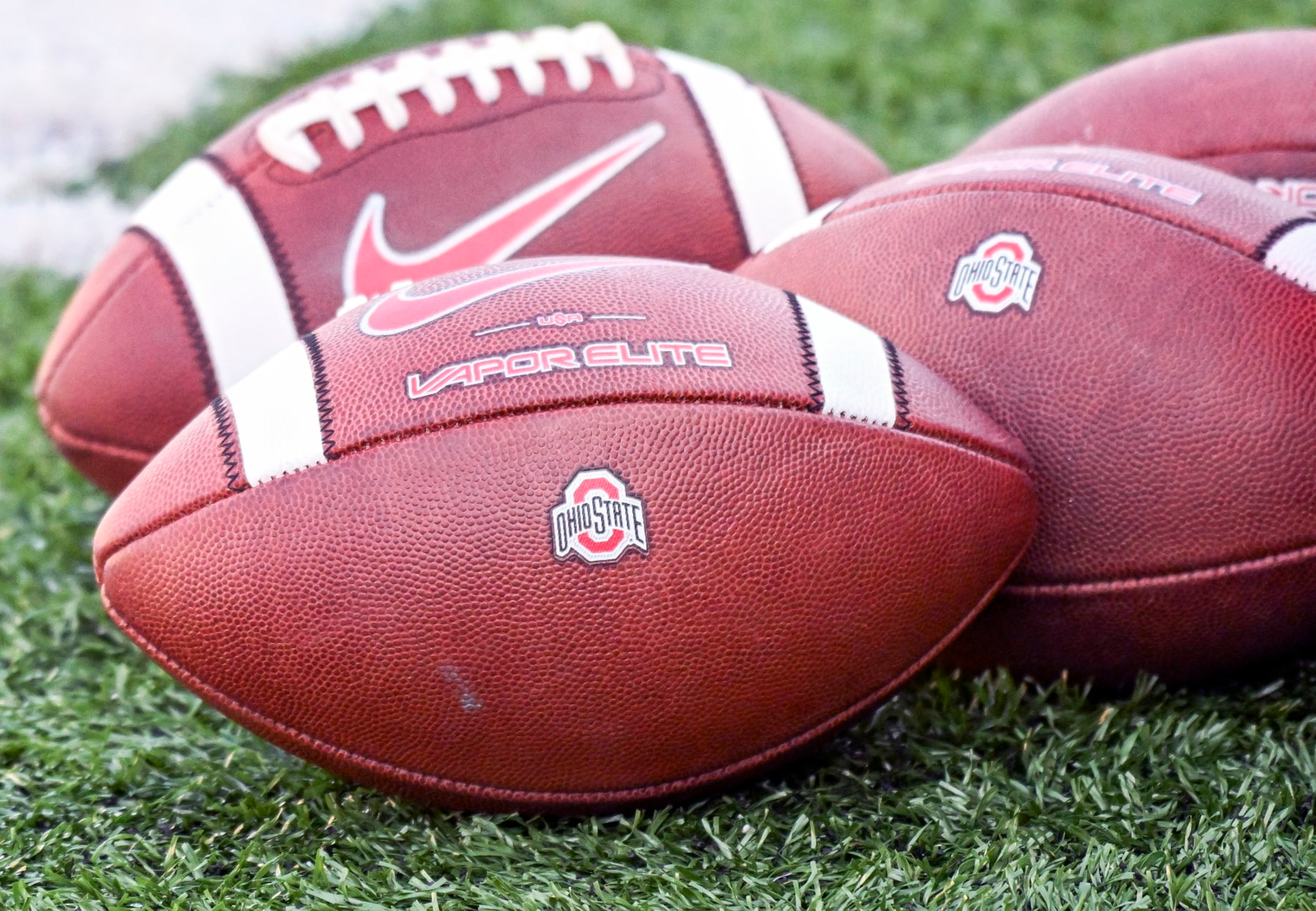 COLLEGE PARK, MD - NOVEMBER 19: Ohio State Buckeyes footballs sit on the sidelines during the Ohio State Buckeyes game versus the Maryland Terrapins on November 19, 2022 at SECU Stadium in College Park, MD.  (Photo by Mark Goldman/Icon Sportswire via Getty Images)