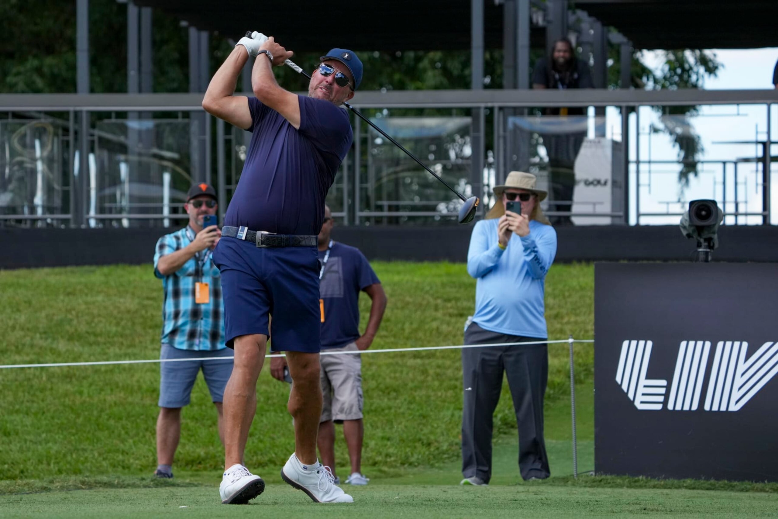 DORAL, FL - OCTOBER 28: Team Captain Phil Mickelson of Hy Flyers GC plays his shot from the tenth tee during the quarterfinals of the LIV Golf Invitational - Miami at Trump National Doral Miami on October 28, 2022 in Doral, Florida. (Photo by Eric Espada/Getty Images) DORAL, FL - OCTOBER 28: Team Captain Phil Mickelson of Hy Flyers GC plays his shot from the tenth tee during the quarterfinals of the LIV Golf Invitational - Miami at Trump National Doral Miami on October 28, 2022 in Doral, Florida. (Photo by Eric Espada/Getty Images)