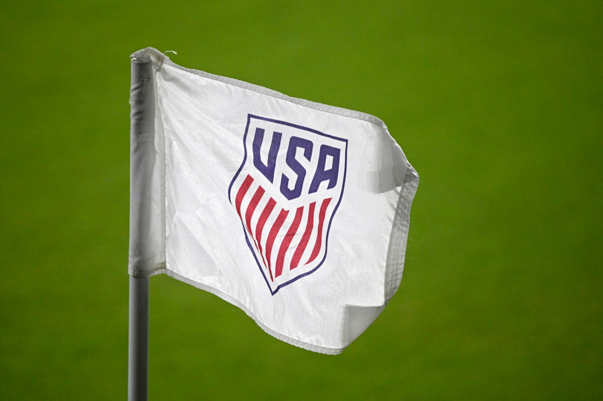 The United States Soccer Federation logo is viewed on a corner flag on the pitch during the first half of an international friendly soccer match between the United States and Trinidad and Tobago, Sunday, Jan. 31, 2021, in Orlando, Fla. (AP Photo/Phelan M. Ebenhack)