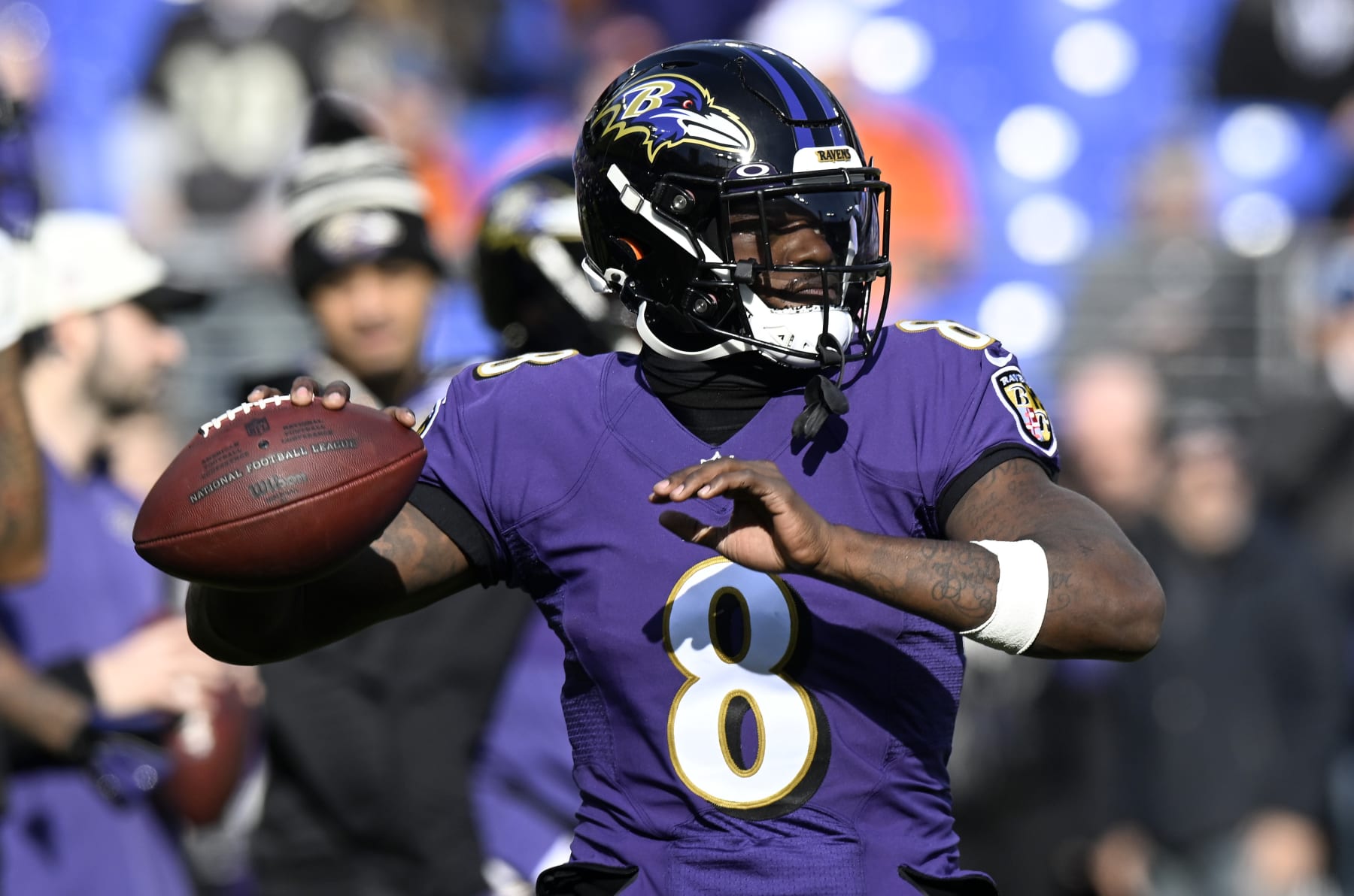 BALTIMORE, MARYLAND - DECEMBER 04: Lamar Jackson #8 of the Baltimore Ravens warms up before the game against the Denver Broncos at M&T Bank Stadium on December 04, 2022 in Baltimore, Maryland. (Photo by G Fiume/Getty Images)