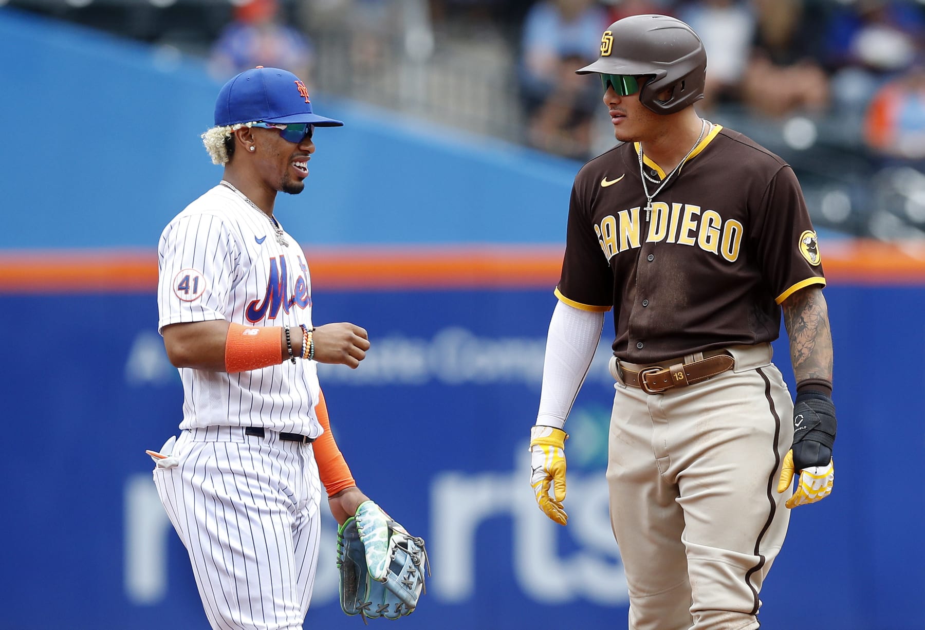 Francisco Lindor (L) and Manny Machado (R)