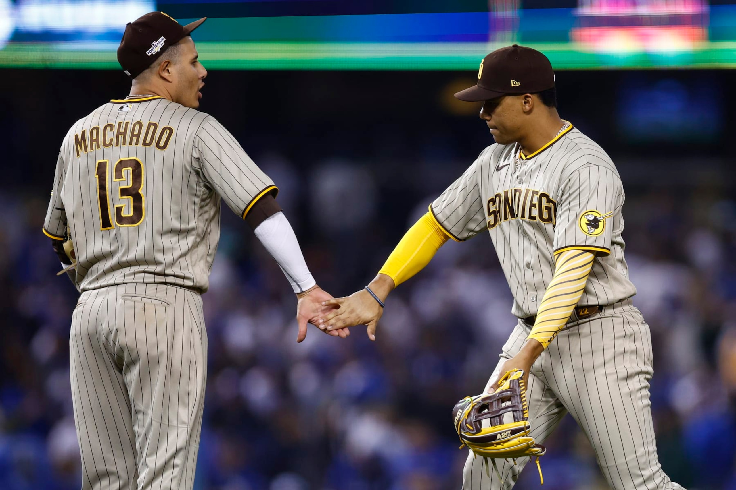 Manny Machado (L) and Juan Soto (R)