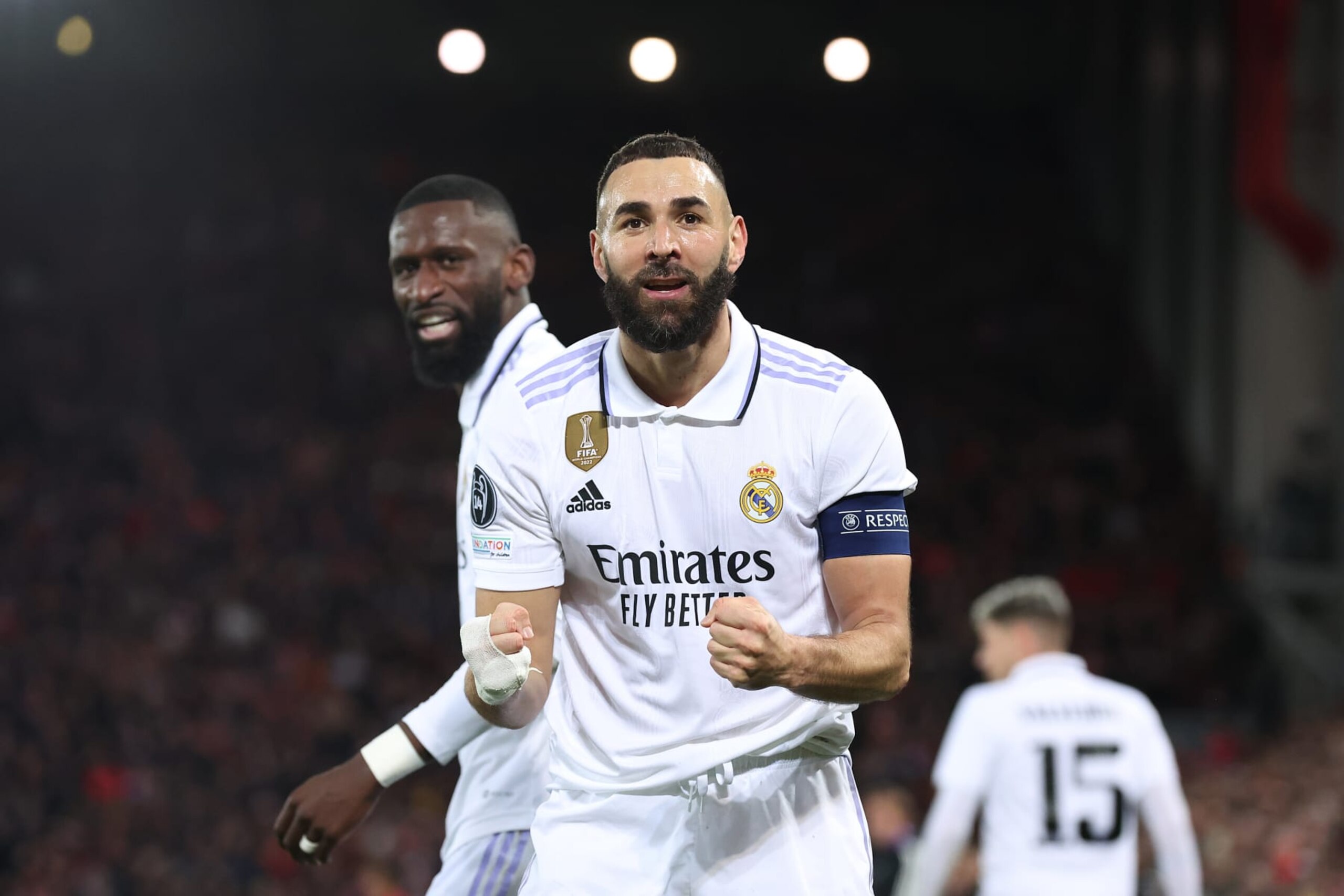 LIVERPOOL, ENGLAND - FEBRUARY 21: Karim Benzema of Real Madrid celebrates after scoring the team's fifth goal during the UEFA Champions League round of 16 leg one match between Liverpool FC and Real Madrid at Anfield on February 21, 2023 in Liverpool, England. (Photo by Alex Livesey - UEFA/UEFA via Getty Images)