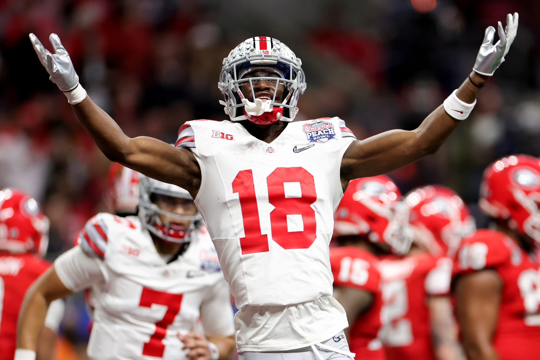 ATLANTA, GEORGIA - DECEMBER 31: Marvin Harrison Jr. #18 of the Ohio State Buckeyes reacts after a touchdown during the first quarter in the Chick-fil-A Peach Bowl at Mercedes-Benz Stadium on December 31, 2022 in Atlanta, Georgia. (Photo by Carmen Mandato/Getty Images)