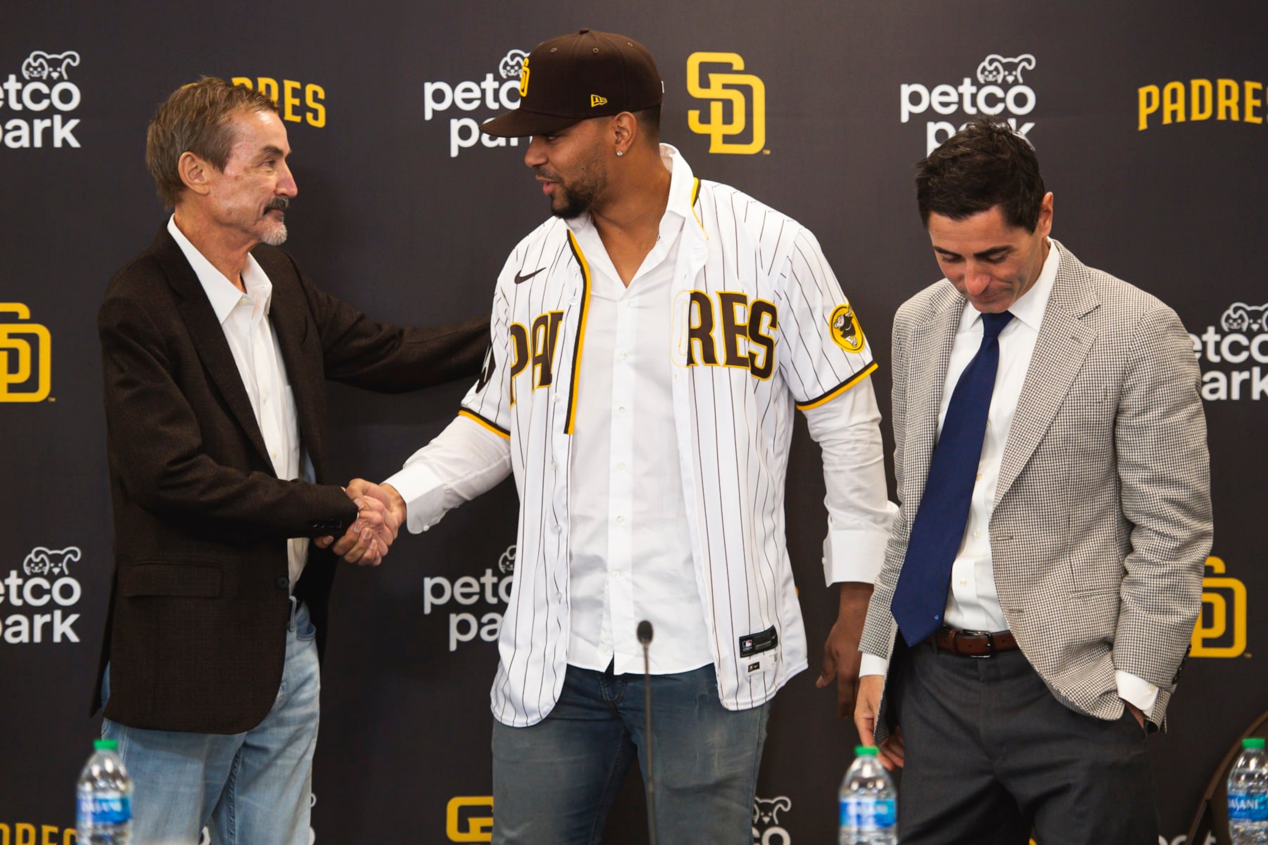 SAN DIEGO, CA - DECEMBER 09: San Diego Padres Chairman Peter Seidler shakes hands with Xander Bogaerts at his introductory press conference at PETCO Park on December 9, 2022 in San Diego, California. (Photo by Matt Thomas/San Diego Padres/Getty Images)