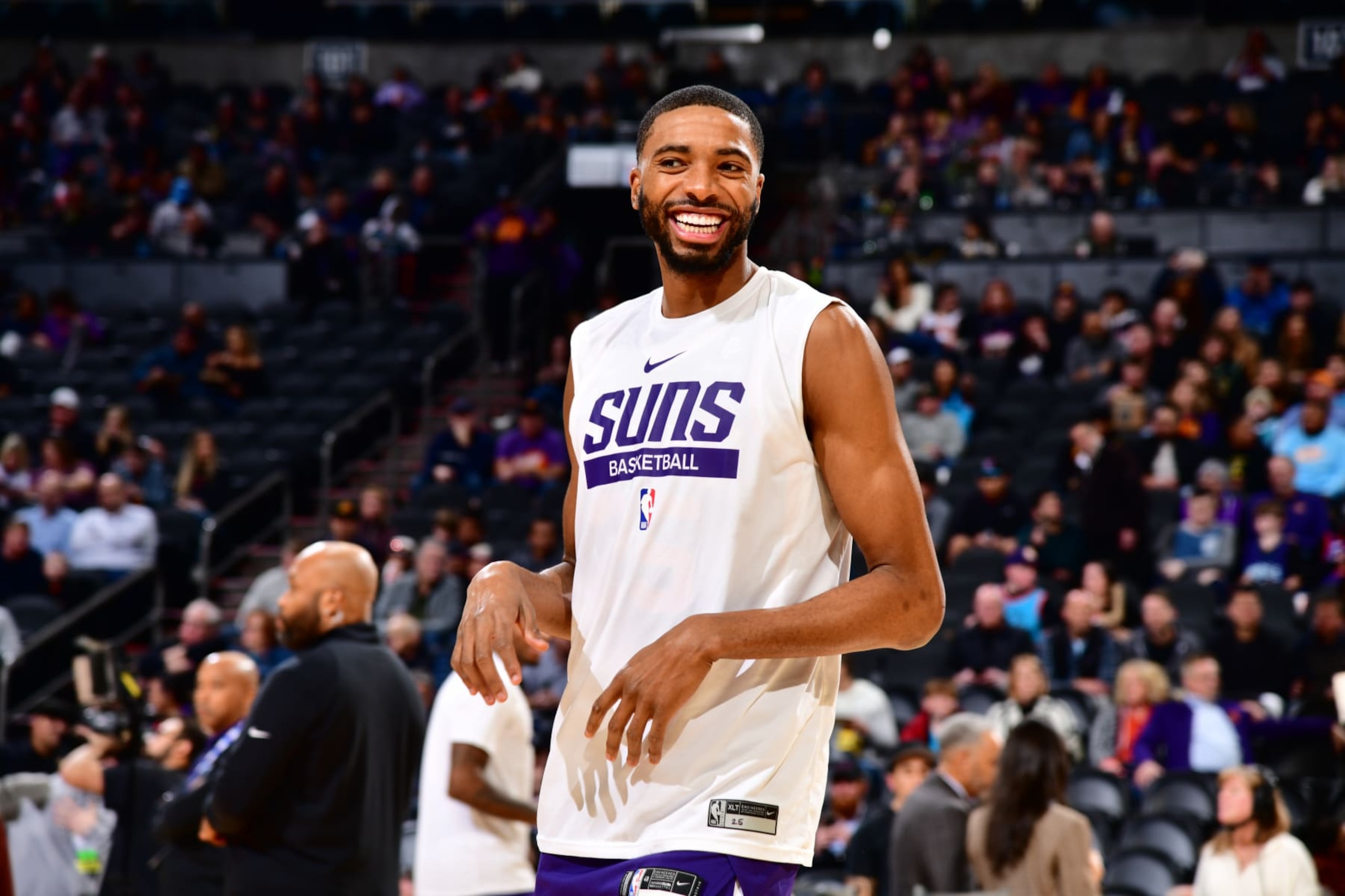 PHOENIX, AZ - JANUARY 24: Mikal Bridges #25 of the Phoenix Suns smiles before the game against the Charlotte Hornets on January 24, 2023 at Footprint Center in Phoenix, Arizona. NOTE TO USER: User expressly acknowledges and agrees that, by downloading and or using this photograph, user is consenting to the terms and conditions of the Getty Images License Agreement. Mandatory Copyright Notice: Copyright 2023 NBAE (Photo by Barry Gossage/NBAE via Getty Images) PHOENIX, AZ - JANUARY 24: Mikal Bridges #25 of the Phoenix Suns smiles before the game against the Charlotte Hornets on January 24, 2023 at Footprint Center in Phoenix, Arizona. NOTE TO USER: User expressly acknowledges and agrees that, by downloading and or using this photograph, user is consenting to the terms and conditions of the Getty Images License Agreement. Mandatory Copyright Notice: Copyright 2023 NBAE (Photo by Barry Gossage/NBAE via Getty Images)