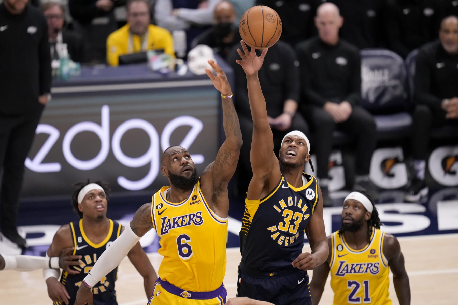 INDIANAPOLIS, IN - FEBRUARY 2: LeBron James #6 of the Los Angeles Lakers and Myles Turner #33 of the Indiana Pacers go up for a jump ball during the game on February 2, 2023 at Gainbridge Fieldhouse in Indianapolis, Indiana. NOTE TO USER: User expressly acknowledges and agrees that, by downloading and or using this Photograph, user is consenting to the terms and conditions of the Getty Images License Agreement. Mandatory Copyright Notice: Copyright 2023 NBAE (Photo by A.J. Mast/NBAE via Getty Images)