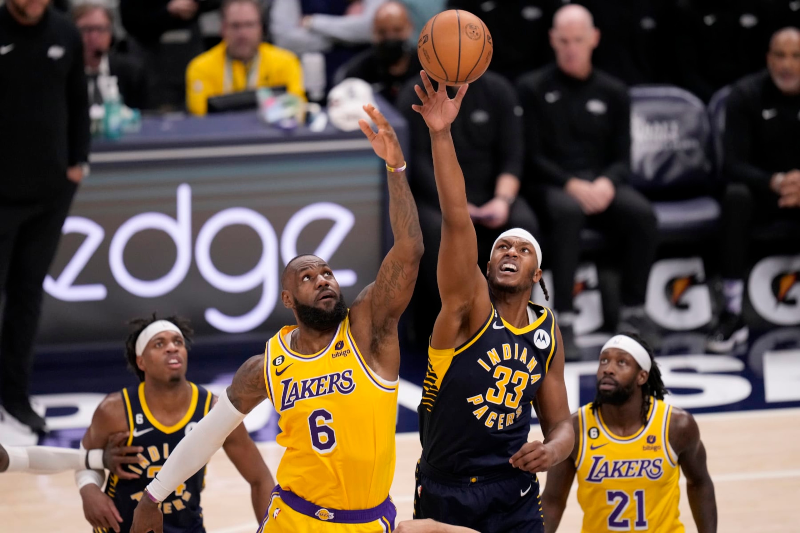 INDIANAPOLIS, IN - FEBRUARY 2: LeBron James #6 of the Los Angeles Lakers and Myles Turner #33 of the Indiana Pacers go up for a jump ball during the game on February 2, 2023 at Gainbridge Fieldhouse in Indianapolis, Indiana. NOTE TO USER: User expressly acknowledges and agrees that, by downloading and or using this Photograph, user is consenting to the terms and conditions of the Getty Images License Agreement. Mandatory Copyright Notice: Copyright 2023 NBAE (Photo by A.J. Mast/NBAE via Getty Images)