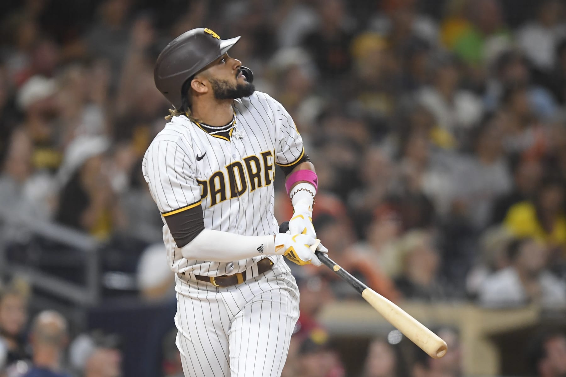 SAN DIEGO, CA - SEPTEMBER 22: Fernando Tatis Jr. #23 of the San Diego Padres hits a solo home run during the seventh inning of a baseball game against the San Francisco Giants at Petco Park on September 22, 2021 in San Diego, California.  (Photo by Denis Poroy/Getty Images)