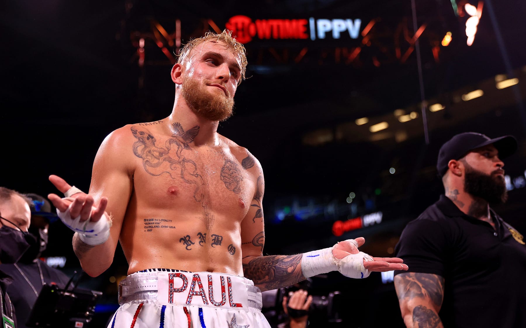 TAMPA, FLORIDA - DECEMBER 18:  Jake Paul reacts to knocking out Tyron Woddley in the sixth round during an eight-round cruiserweight bout at the Amalie Arena on December 18, 2021 in Tampa, Florida. (Photo by Mike Ehrmann/Getty Images)