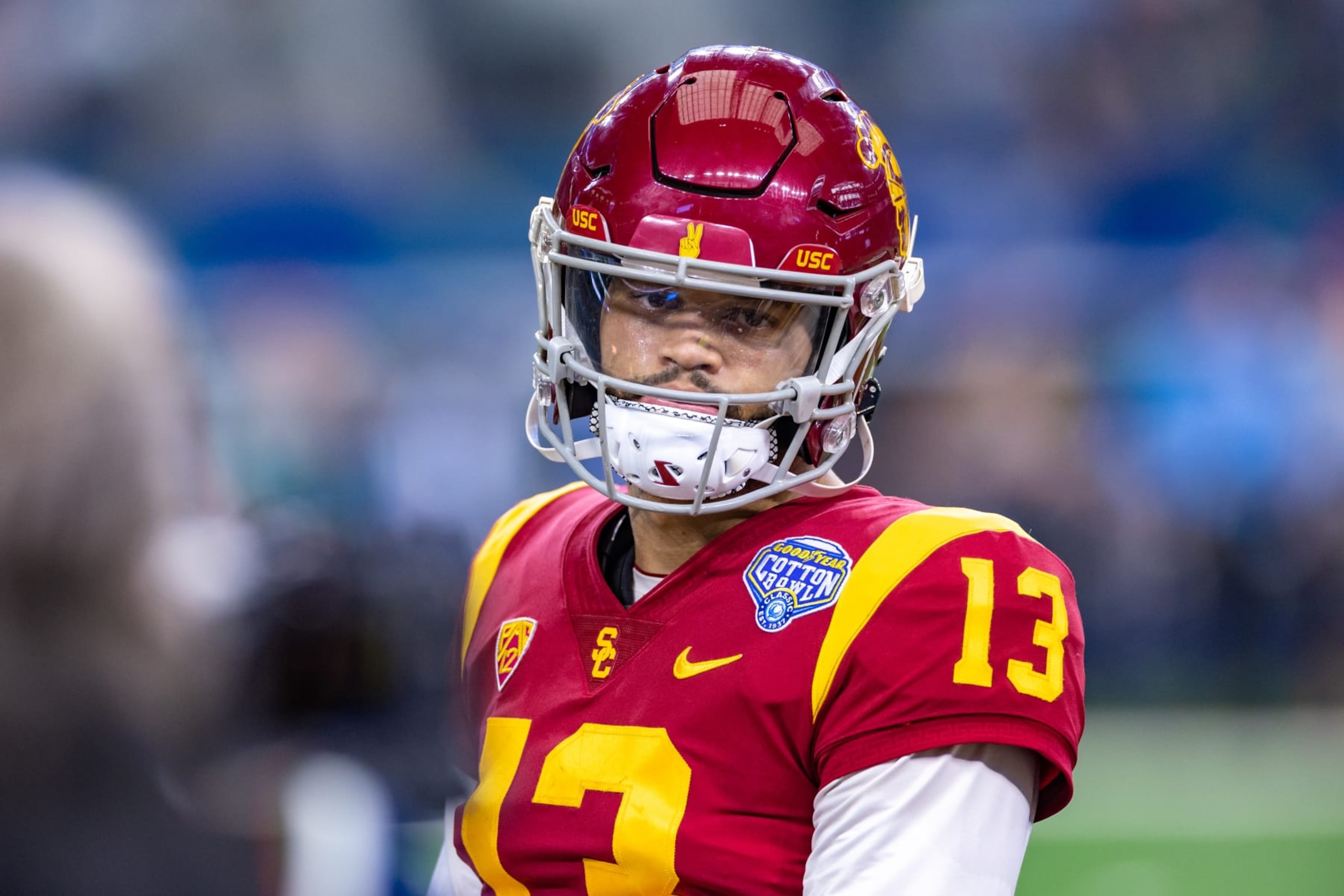 ARLINGTON, TX - JANUARY 02: USC Trojans quarterback Caleb Williams (#13) looks to the sideline during the Goodyear Cotton Bowl game between the USC Trojans and Tulane Green Wave on January 02, 2023 at AT&T Stadium in Arlington, TX. (Photo by Matthew Visinsky/Icon Sportswire via Getty Images) ARLINGTON, TX - JANUARY 02: USC Trojans quarterback Caleb Williams (#13) looks to the sideline during the Goodyear Cotton Bowl game between the USC Trojans and Tulane Green Wave on January 02, 2023 at AT&T Stadium in Arlington, TX. (Photo by Matthew Visinsky/Icon Sportswire via Getty Images)