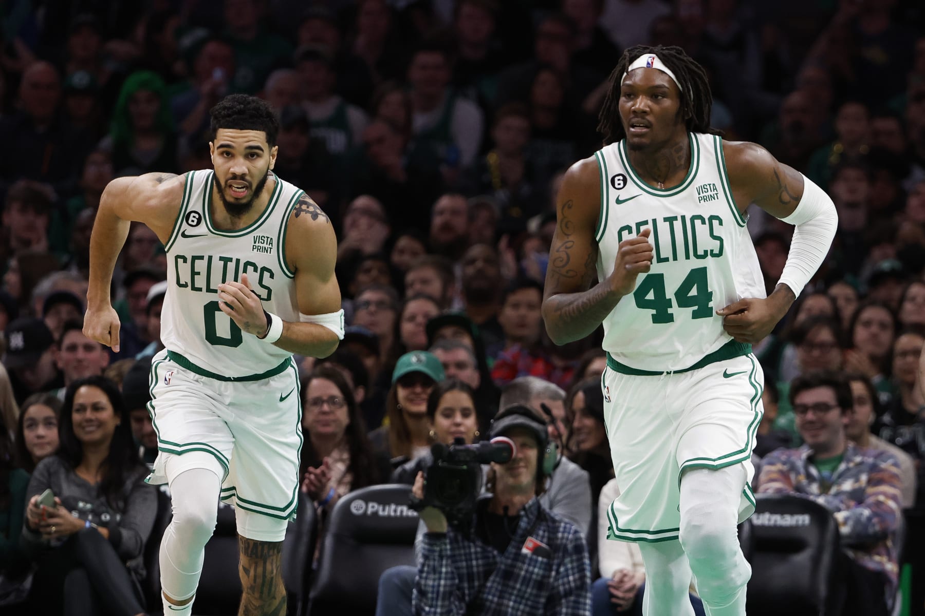 BOSTON, MA - DECEMBER 27: Jayson Tatum #0 of the Boston Celtics and Robert Williams III #44 head up court against the Houston Rockets during the second half at TD Garden on December 27, 2022 in Boston, Massachusetts. NOTE TO USER: User expressly acknowledges and agrees that, by downloading and/or using this Photograph, user is consenting to the terms and conditions of the Getty Images License Agreement. (Photo By Winslow Townson/Getty Images)