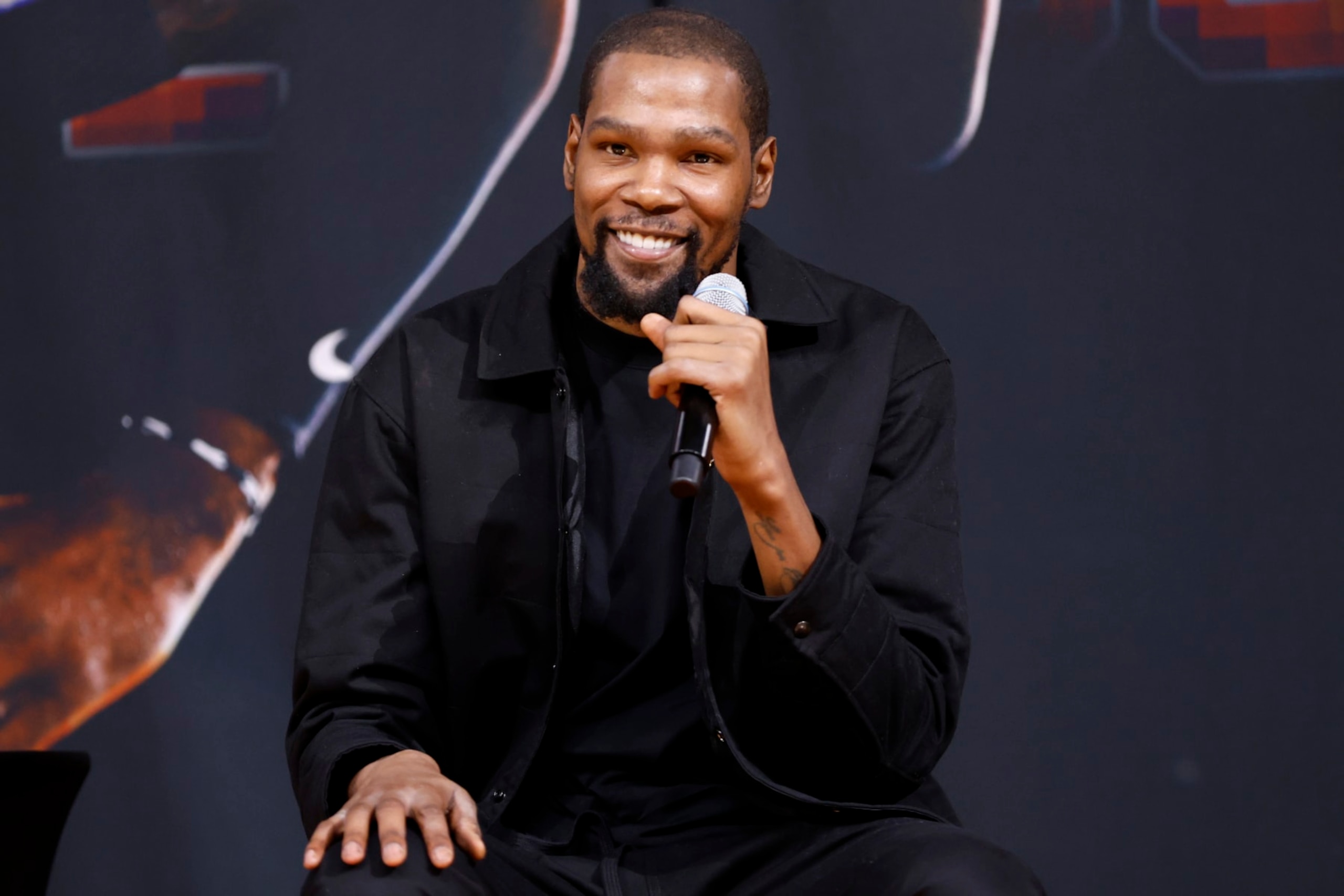 PHOENIX, ARIZONA - FEBRUARY 16: Kevin Durant of the Phoenix Suns smiles during a press conference at Footprint Center on February 16, 2023 in Phoenix, Arizona. NOTE TO USER: User expressly acknowledges and agrees that, by downloading and/or using this photograph, User is consenting to the terms and conditions of the Getty Images License Agreement.  (Photo by Chris Coduto/Getty Images)