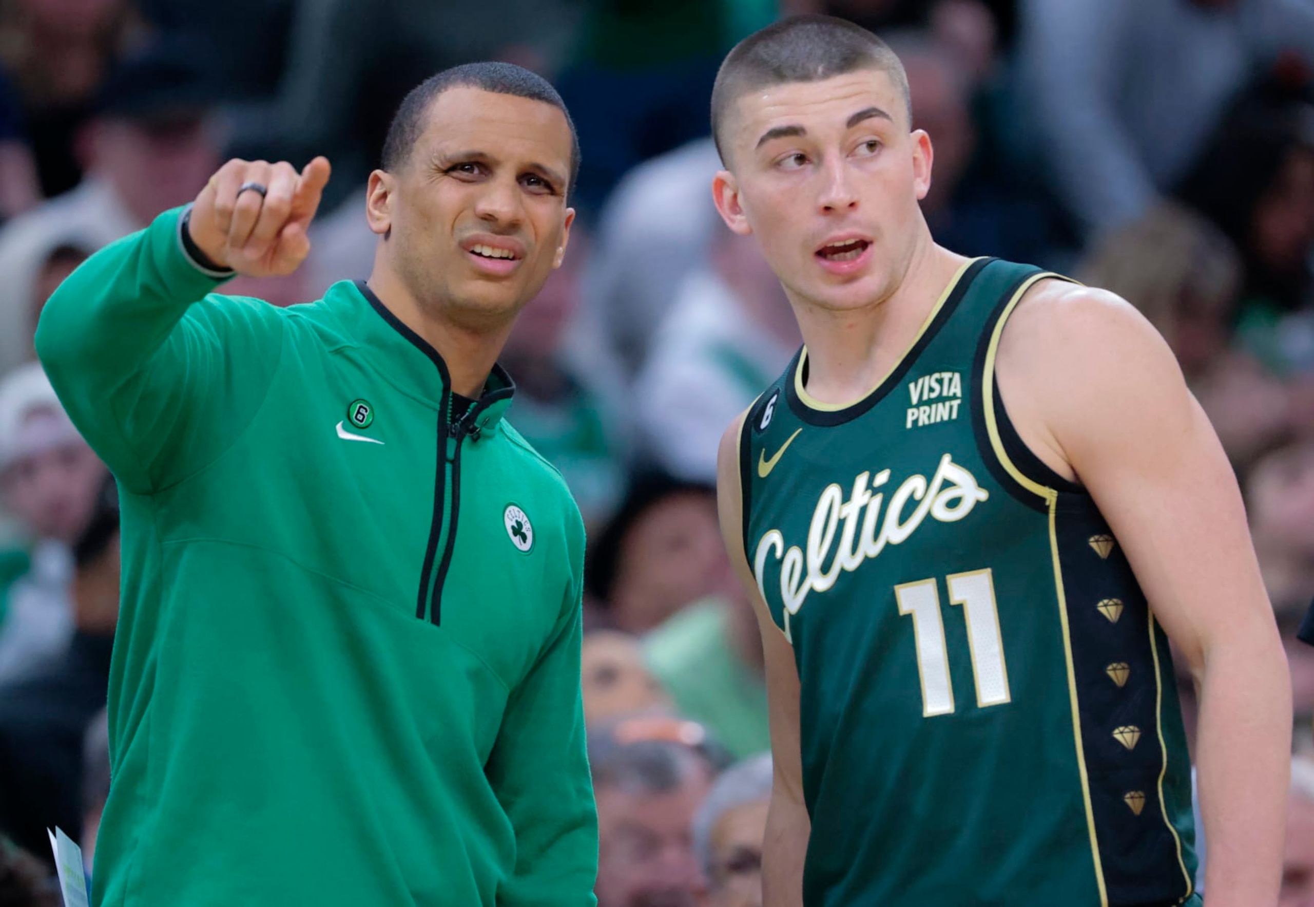 Boston, MA - February 12: Boston Celtics interim head coach Joe Mazzulla talks to PG Payton Pritchard in the third quarter. The Celtics beat the Memphis Grizzlies, 119-109. (Photo by Matthew J. Lee/The Boston Globe via Getty Images)