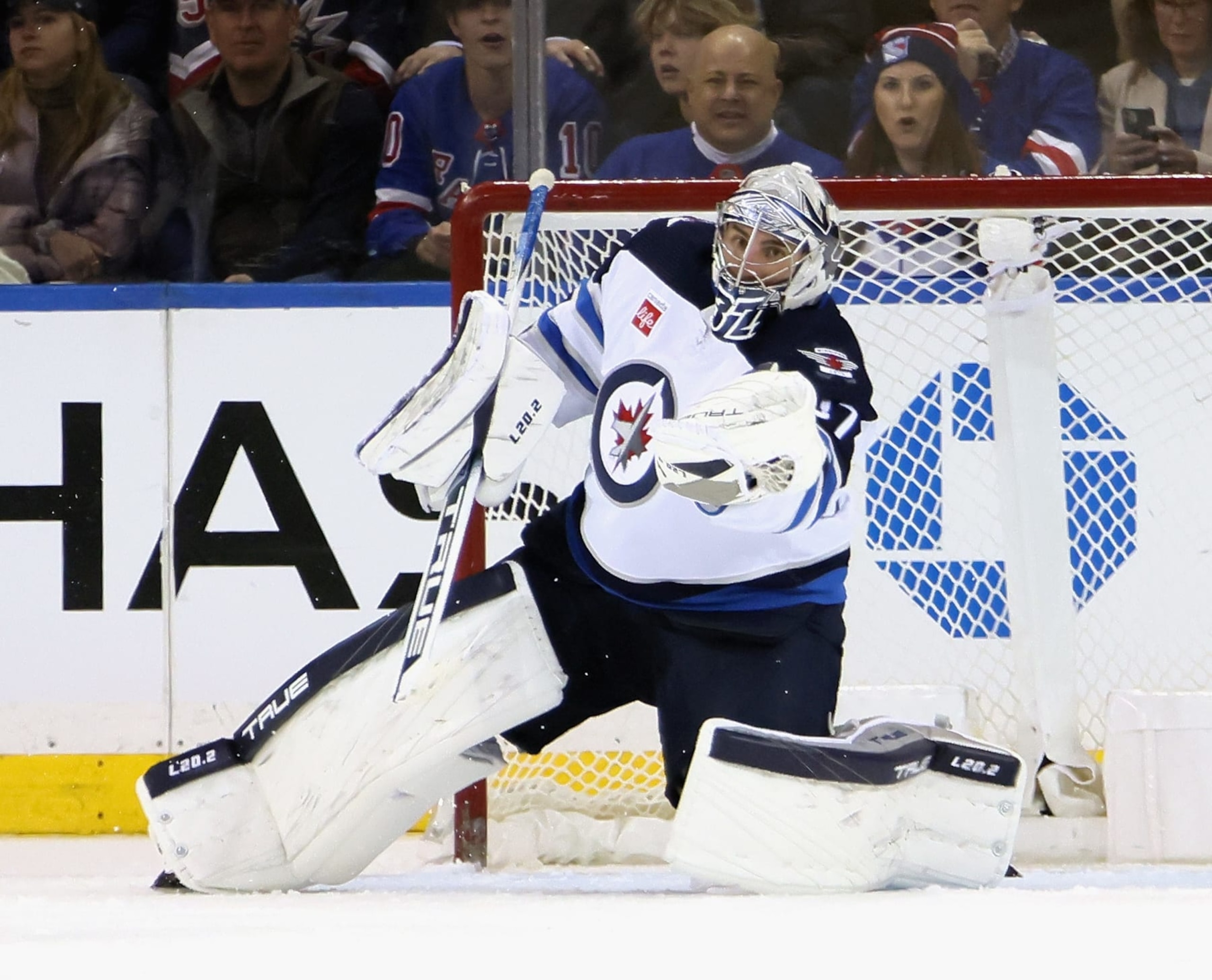 NEW YORK, NEW YORK - FEBRUARY 20: Connor Hellebuyck #37 of the Winnipeg Jets makes the third period save against the New York Rangers at Madison Square Garden on February 20, 2023 in New York City. The Jets defeated the Rangers 4-1. (Photo by Bruce Bennett/Getty Images)
