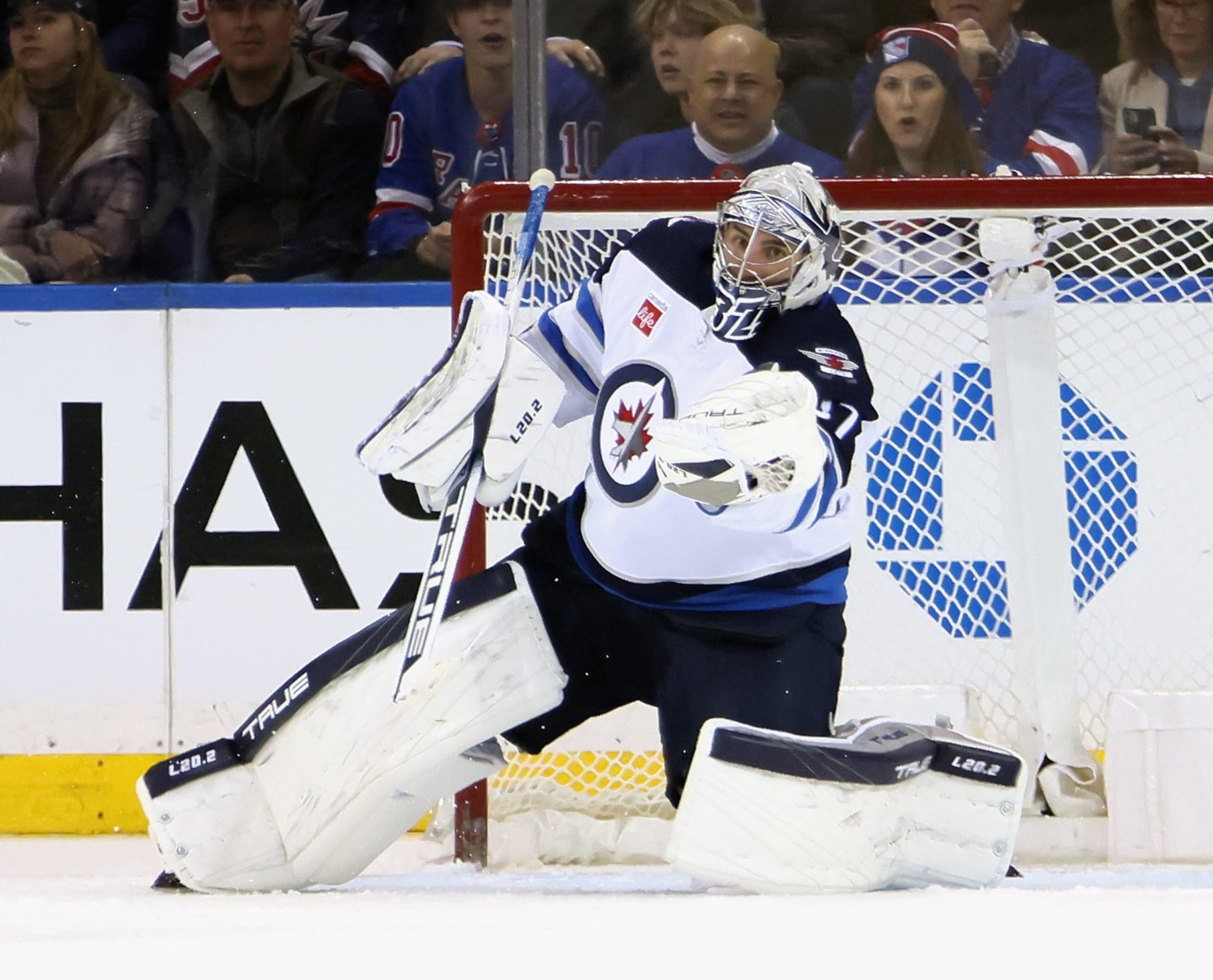 NEW YORK, NEW YORK - FEBRUARY 20: Connor Hellebuyck #37 of the Winnipeg Jets makes the third period save against the New York Rangers at Madison Square Garden on February 20, 2023 in New York City. The Jets defeated the Rangers 4-1. (Photo by Bruce Bennett/Getty Images)