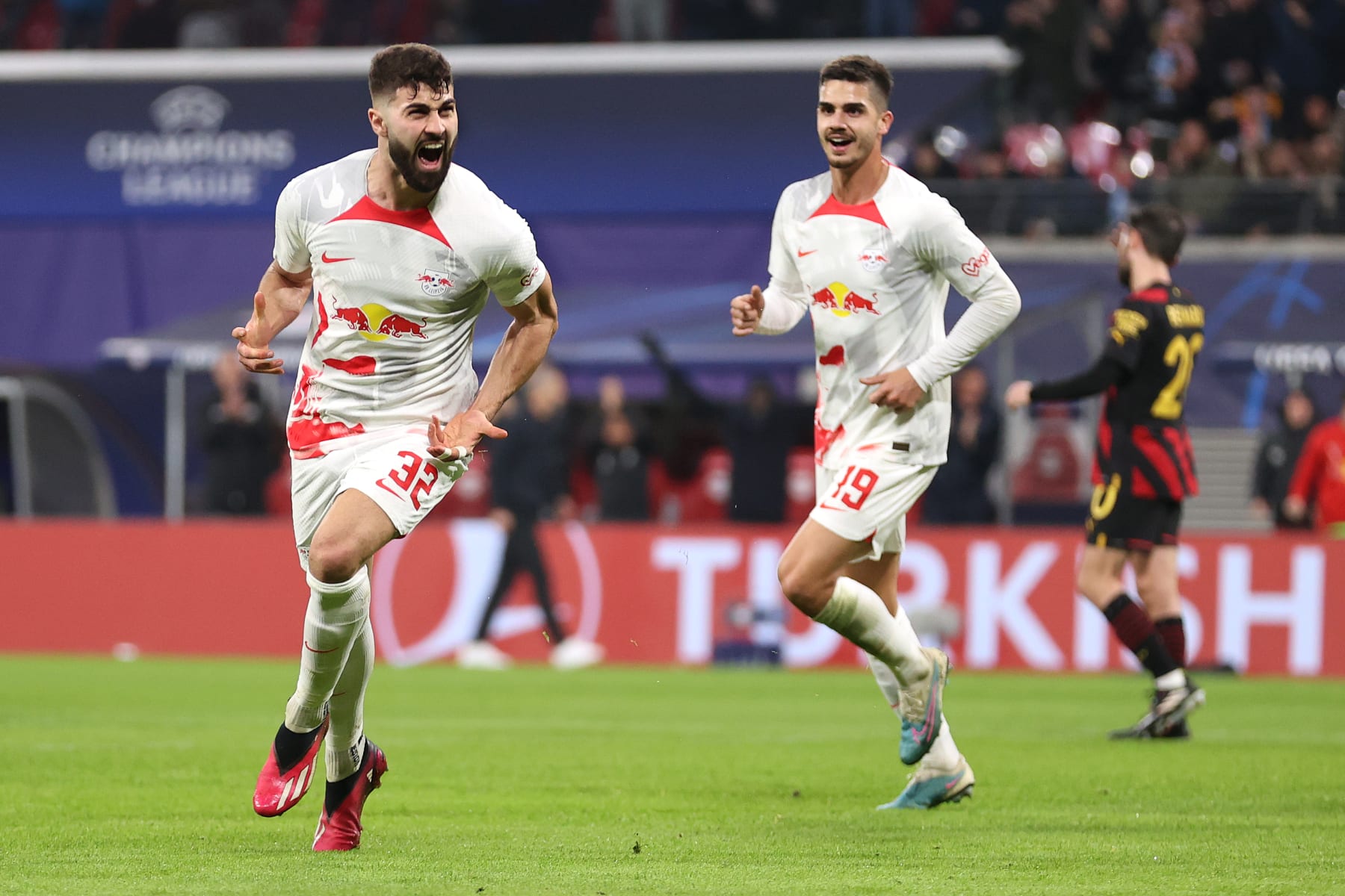 LEIPZIG, GERMANY - FEBRUARY 22: Josko Gvardiol of RB Leipzig celebrates after scoring the team's first goal during the UEFA Champions League round of 16 leg one match between RB Leipzig and Manchester City at Red Bull Arena on February 22, 2023 in Leipzig, Germany. (Photo by Lars Baron/Getty Images)