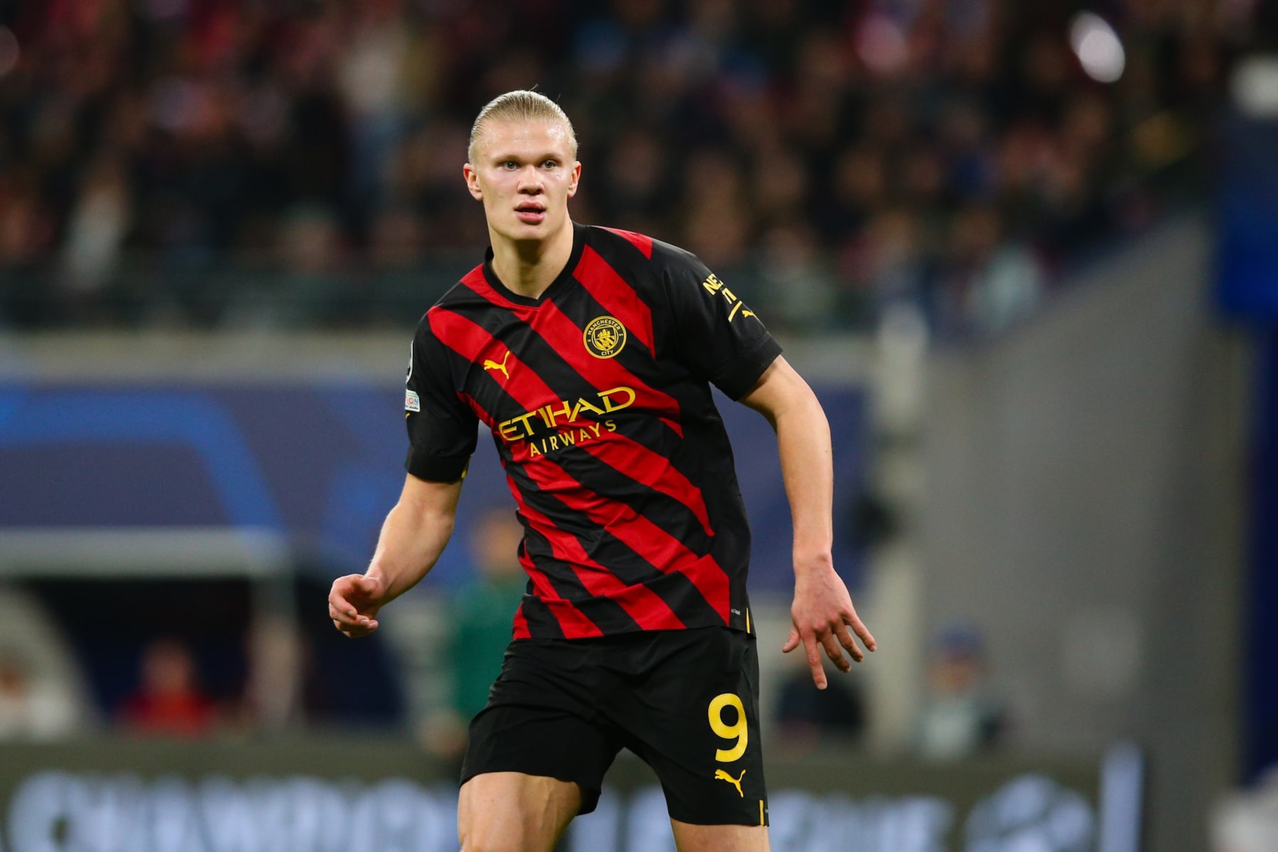 LEIPZIG, GERMANY - FEBRUARY 22: Erling Haaland of Manchester City looks on during the UEFA Champions League round of 16 leg one match between RB Leipzig and Manchester City at Red Bull Arena on February 22, 2023 in Leipzig, Germany. (Photo by Craig Mercer/MB Media/Getty Images) LEIPZIG, GERMANY - FEBRUARY 22: Erling Haaland of Manchester City looks on during the UEFA Champions League round of 16 leg one match between RB Leipzig and Manchester City at Red Bull Arena on February 22, 2023 in Leipzig, Germany. (Photo by Craig Mercer/MB Media/Getty Images)