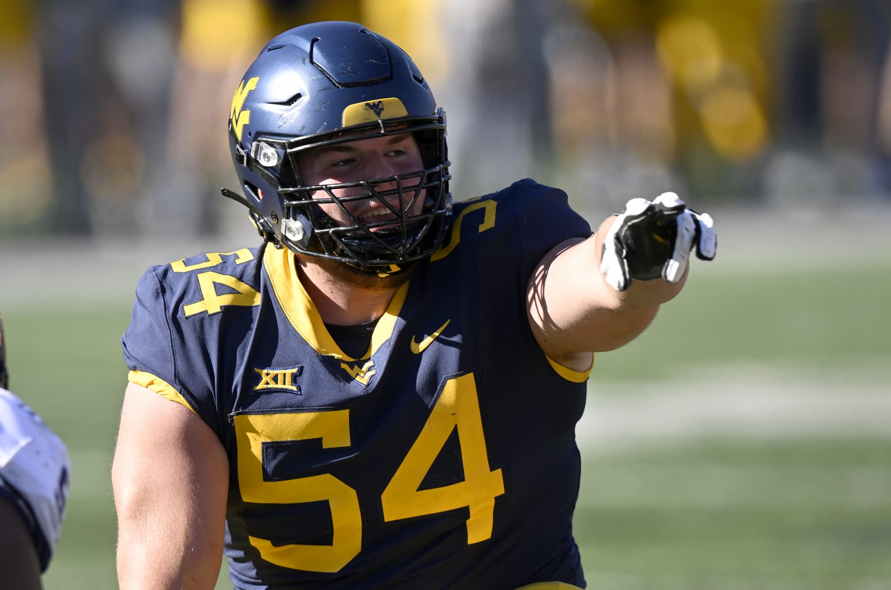 MORGANTOWN, WEST VIRGINIA - OCTOBER 29: Zach Frazier #54 of the West Virginia Mountaineers lines up against the TCU Horned Frogs at Mountaineer Field on October 29, 2022 in Morgantown, West Virginia. (Photo by G Fiume/Getty Images)