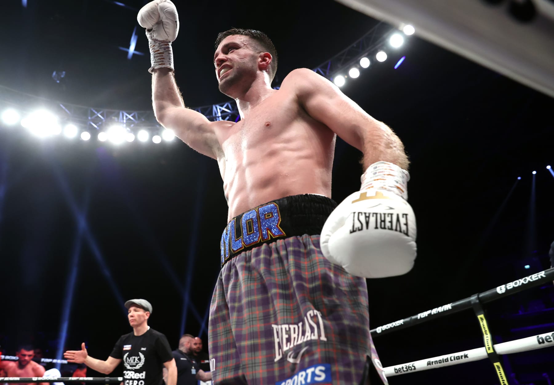 GLASGOW, SCOTLAND - FEBRUARY 26: Josh Taylor raises his fist after his fight with Jack Catterall for the undisputed super lightweight championship at The OVO Hydro on February 26, 2022 in Glasgow, Scotland. (Photo by Mikey Williams/Top Rank Inc via Getty Images)