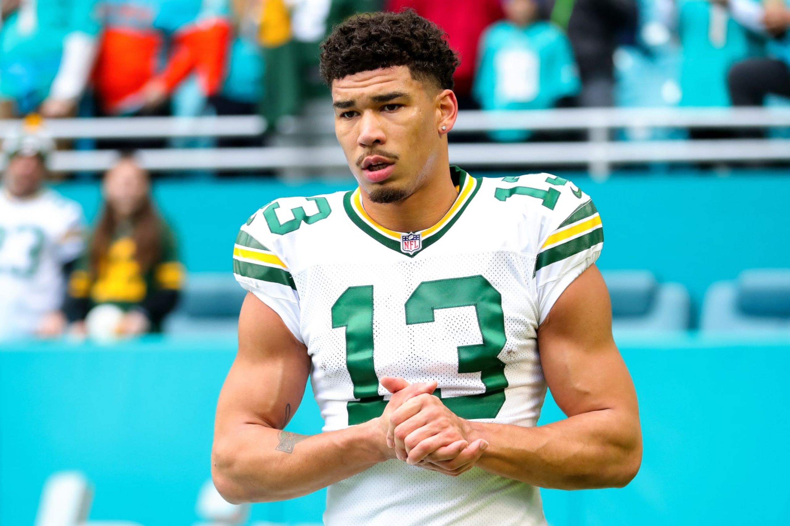 MIAMI GARDENS, FLORIDA - DECEMBER 25: Allen Lazard #13 of the Green Bay Packers looks on at halftime against the Miami Dolphins at Hard Rock Stadium on December 25, 2022 in Miami Gardens, Florida. (Photo by Megan Briggs/Getty Images)