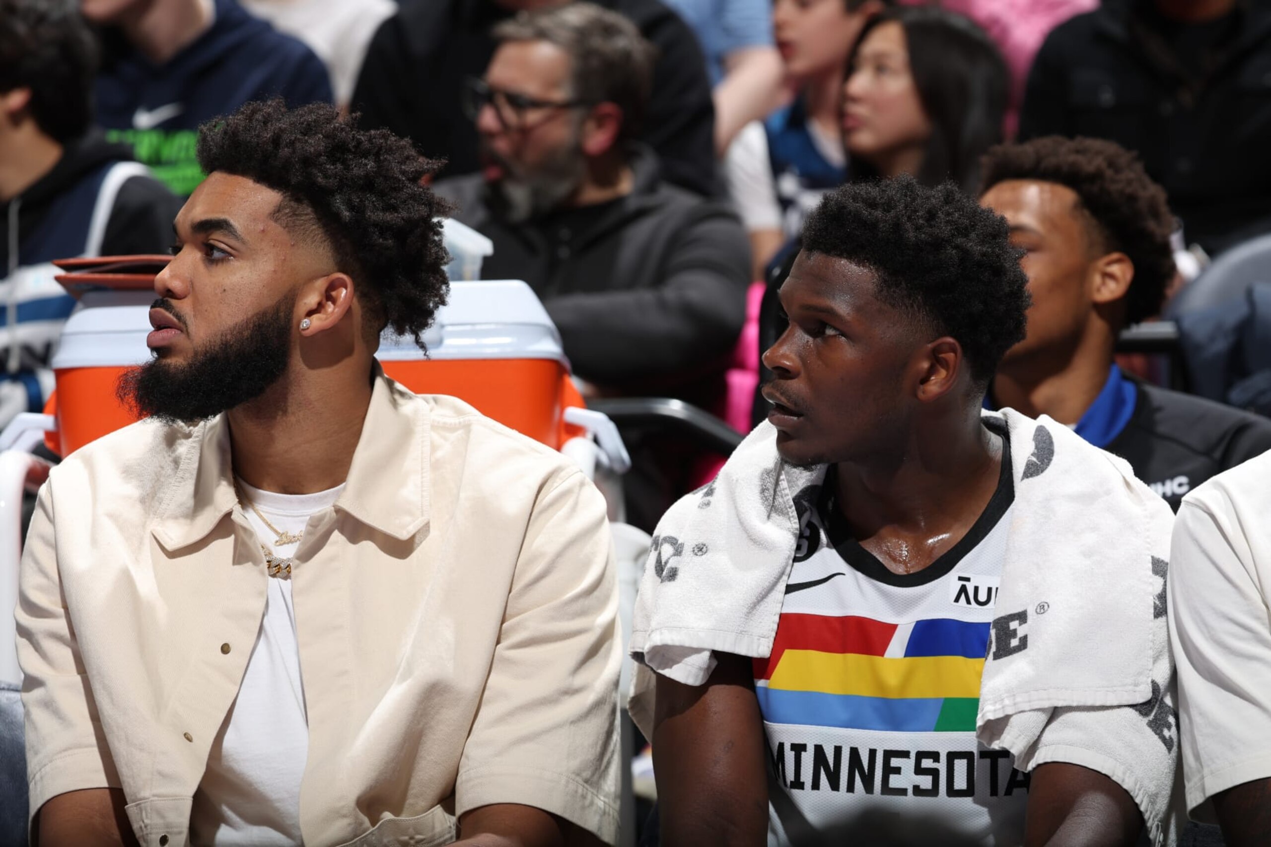 MINNEAPOLIS, MN - DECEMBER 18: Minnesota Timberwolves teammates Karl-Anthony Towns #32 and Anthony Edwards #1 look on from the bench during the game against the Chicago Bulls on December 18, 2022 at Target Center in Minneapolis, Minnesota. NOTE TO USER: User expressly acknowledges and agrees that, by downloading and or using this Photograph, user is consenting to the terms and conditions of the Getty Images License Agreement. Mandatory Copyright Notice: Copyright 2022 NBAE (Photo by David Sherman/NBAE via Getty Images) MINNEAPOLIS, MN - DECEMBER 18: Minnesota Timberwolves teammates Karl-Anthony Towns #32 and Anthony Edwards #1 look on from the bench during the game against the Chicago Bulls on December 18, 2022 at Target Center in Minneapolis, Minnesota. NOTE TO USER: User expressly acknowledges and agrees that, by downloading and or using this Photograph, user is consenting to the terms and conditions of the Getty Images License Agreement. Mandatory Copyright Notice: Copyright 2022 NBAE (Photo by David Sherman/NBAE via Getty Images)