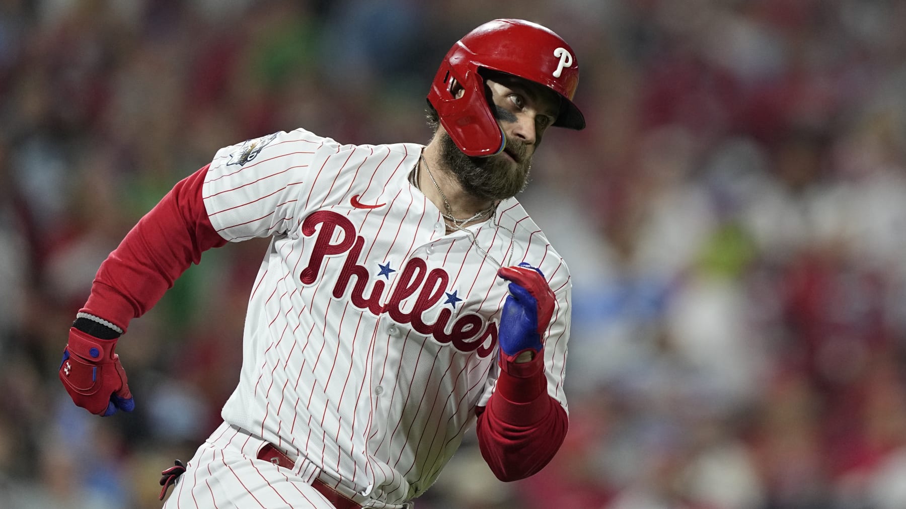 Philadelphia Phillies' Bryce Harper runs during the eighth inning in Game 3 of baseball's World Series between the Houston Astros and the Philadelphia Phillies on Tuesday, Nov. 1, 2022, in Philadelphia. (AP Photo/David J. Phillip)