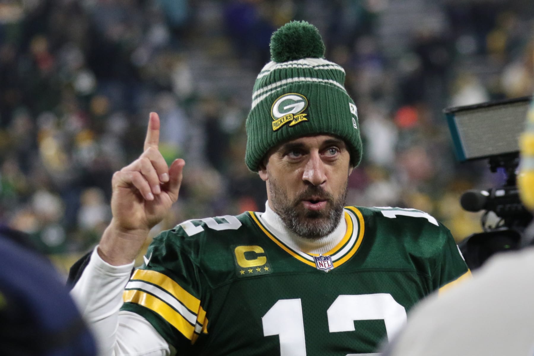 GREEN BAY, WI - JANUARY 01: Green Bay Packers quarterback Aaron Rodgers (12) acknowledges they need one more win during a game between the Green Bay Packers and the Minnesota Vikings on January 1, 2023 at Lambeau Field in Green Bay, WI. (Photo by Larry Radloff/Icon Sportswire via Getty Images)