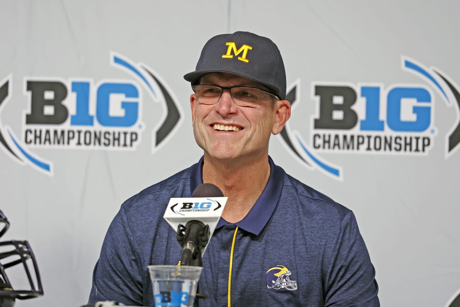 INDIANAPOLIS, IN - DECEMBER 03: Michigan Wolverines coach Jim Harbaugh attends a press conference after defeating the Purdue Boilermakers on December 3, 2022, and winning the Big 10 Football Championship at Lucas Oil Stadium in Indianapolis, Indiana. (Photo by Brian Spurlock/Icon Sportswire via Getty Images)
