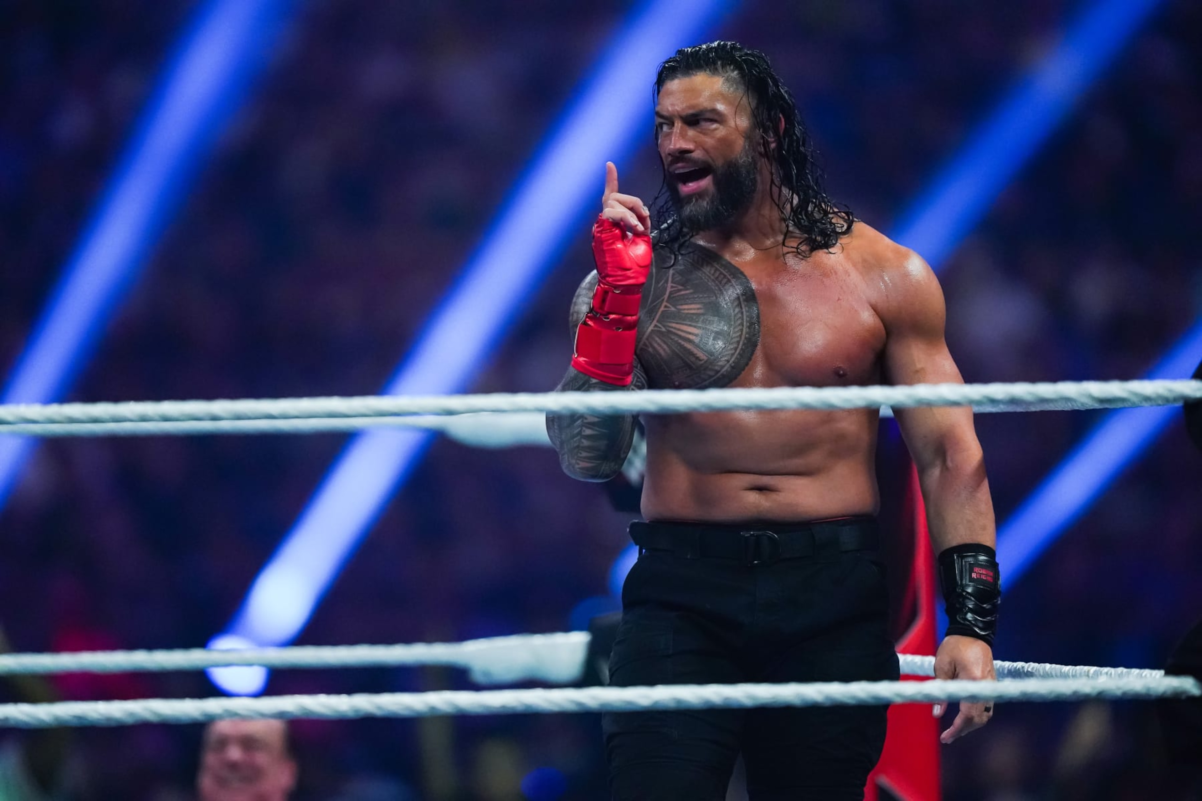SAN ANTONIO, TEXAS - JANUARY 28: Roman Reigns looks on during the WWE and Universal Championship match during the WWE Royal Rumble event at the Alamodome on January 28, 2023 in San Antonio, Texas. (Photo by Alex Bierens de Haan/Getty Images) SAN ANTONIO, TEXAS - JANUARY 28: Roman Reigns looks on during the WWE and Universal Championship match during the WWE Royal Rumble event at the Alamodome on January 28, 2023 in San Antonio, Texas. (Photo by Alex Bierens de Haan/Getty Images)