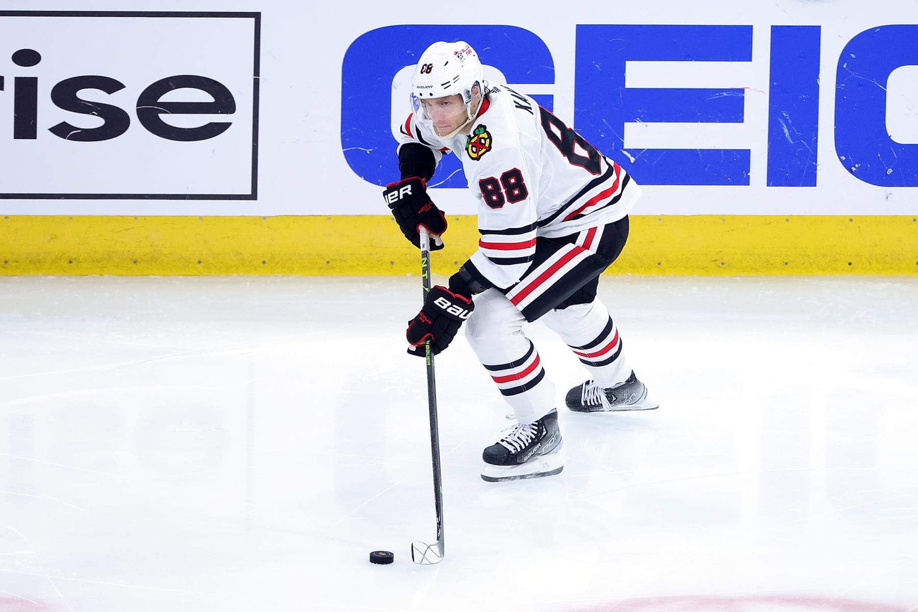 CHICAGO, ILLINOIS - FEBRUARY 19: Patrick Kane #88 of the Chicago Blackhawks controls the puck against the Toronto Maple Leafs at United Center on February 19, 2023 in Chicago, Illinois. The Blackhawks defeated the Maple Leafs 5-3. (Photo by Stacy Revere/Getty Images)