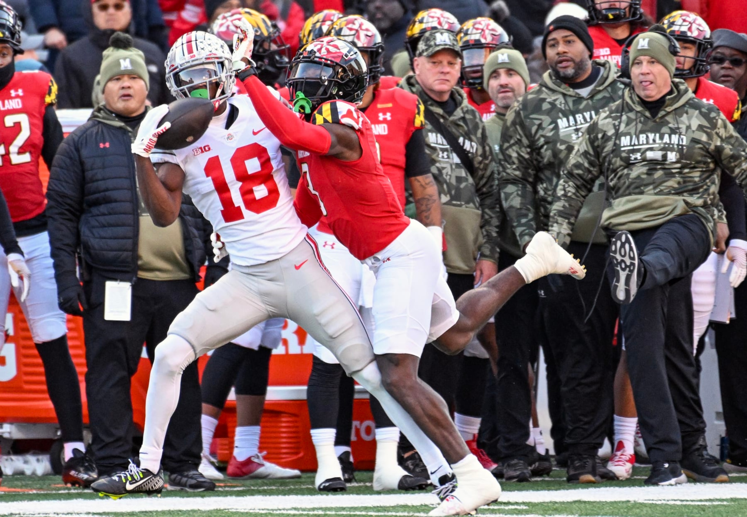 COLLEGE PARK, MD - NOVEMBER 19: Ohio State Buckeyes wide receiver Marvin Harrison Jr. (18) makes a one handed catch against the defense of Maryland Terrapins defensive back Deonte Banks (3) during the Ohio State Buckeyes game versus the Maryland Terrapins on November 19, 2022 at SECU Stadium in College Park, MD. (Photo by Mark Goldman/Icon Sportswire via Getty Images) COLLEGE PARK, MD - NOVEMBER 19: Ohio State Buckeyes wide receiver Marvin Harrison Jr. (18) makes a one handed catch against the defense of Maryland Terrapins defensive back Deonte Banks (3) during the Ohio State Buckeyes game versus the Maryland Terrapins on November 19, 2022 at SECU Stadium in College Park, MD. (Photo by Mark Goldman/Icon Sportswire via Getty Images)