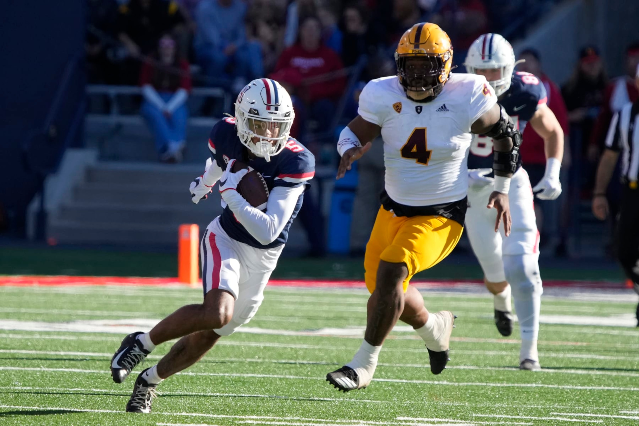 Arizona wide receiver Dorian Singer (5) in the second half during an NCAA college football game against Arizona State, Friday, Nov. 25, 2022, in Tucson, Ariz. Arizona won 38-35. (AP Photo/Rick Scuteri) Arizona wide receiver Dorian Singer (5) in the second half during an NCAA college football game against Arizona State, Friday, Nov. 25, 2022, in Tucson, Ariz. Arizona won 38-35. (AP Photo/Rick Scuteri)