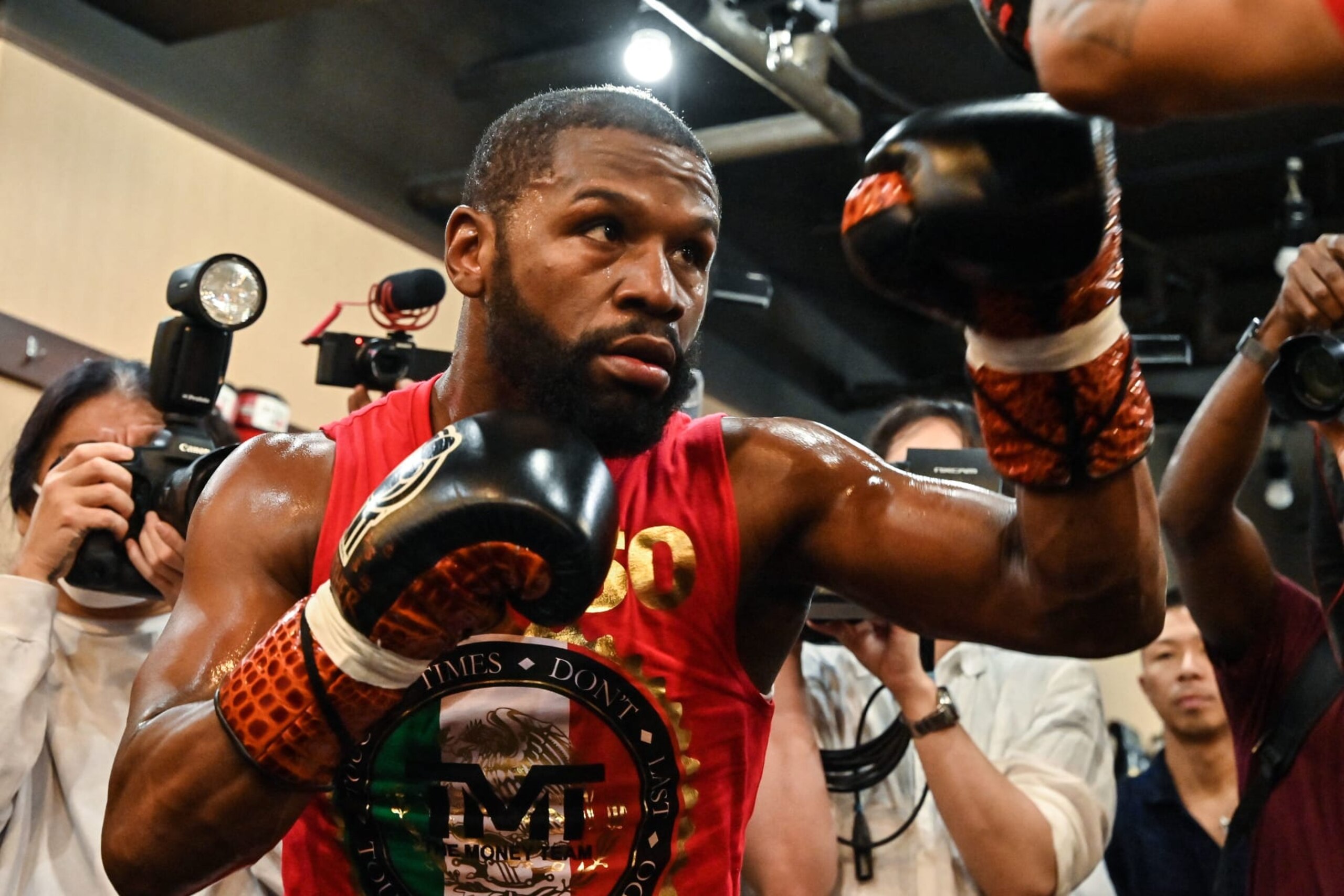 TOPSHOT - US boxer great Floyd Mayweather takes part in a training session at a gym in Tokyo on September 22, 2022, ahead of his planned exhibition boxing match against Japanese mixed martial artist Mikuru Asakura on September 25. (Photo by Richard A. Brooks / AFP) (Photo by RICHARD A. BROOKS/AFP via Getty Images)