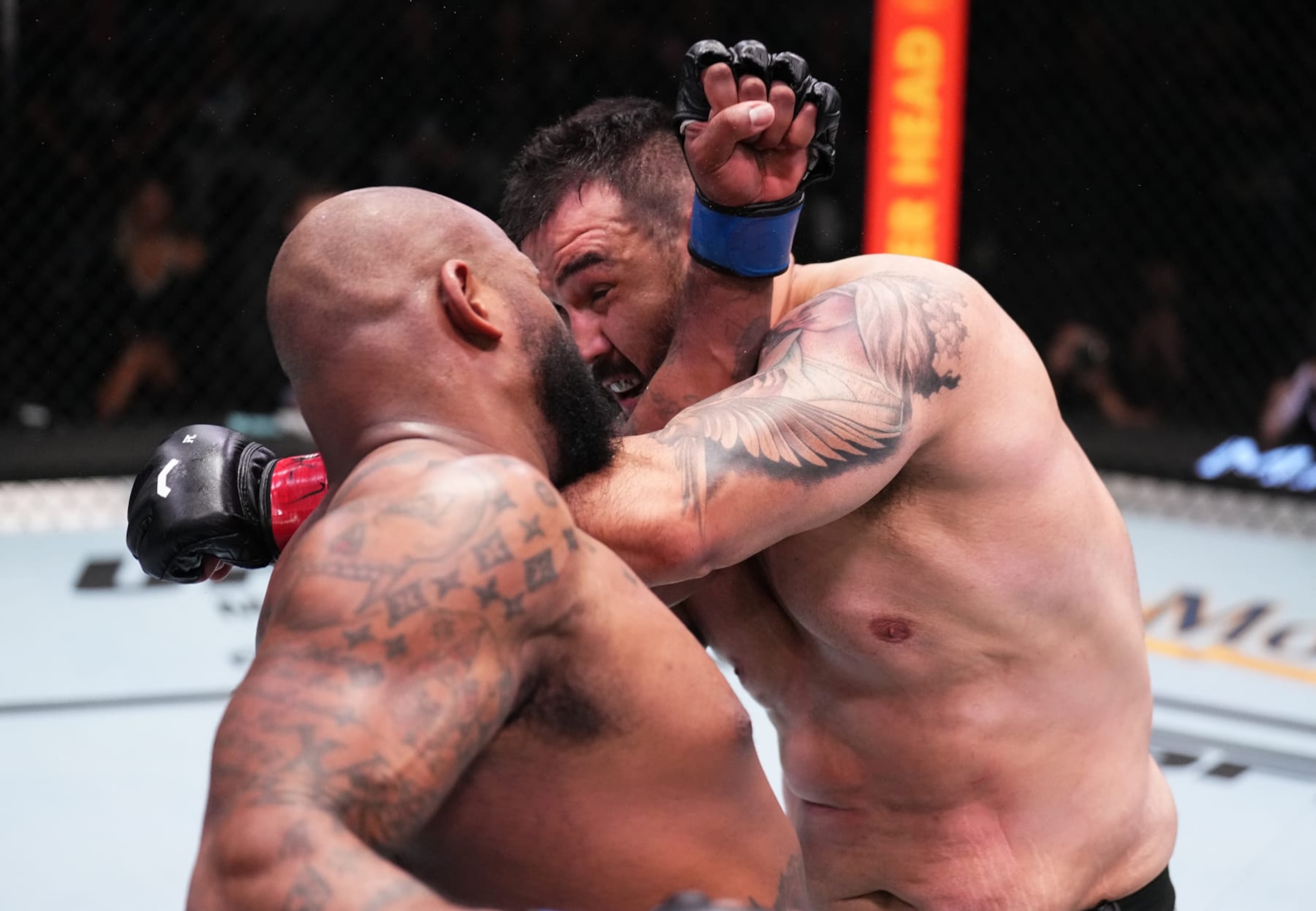 LAS VEGAS, NEVADA - FEBRUARY 25: (R-L) Augusto Sakai of Brazil battles Don'Tale Mayes in a heavyweight fight during the UFC Fight Night event at UFC APEX on February 25, 2023 in Las Vegas, Nevada. (Photo by Chris Unger/Zuffa LLC via Getty Images)