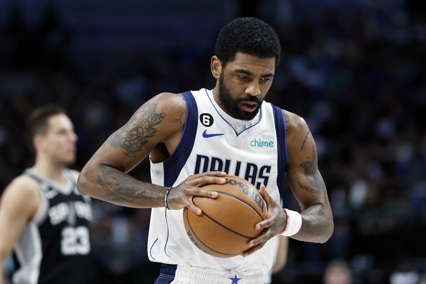 DALLAS, TEXAS - FEBRUARY 23: Kyrie Irving #2 of the Dallas Mavericks holds the ball before the game against the San Antonio Spurs at American Airlines Center on February 23, 2023 in Dallas, Texas. NOTE TO USER: User expressly acknowledges and agrees that, by downloading and or using this photograph, User is consenting to the terms and conditions of the Getty Images License Agreement. (Photo by Tim Heitman/Getty Images) (Photo by Tim Heitman/Getty Images) (Photo by Tim Heitman/Getty Images)