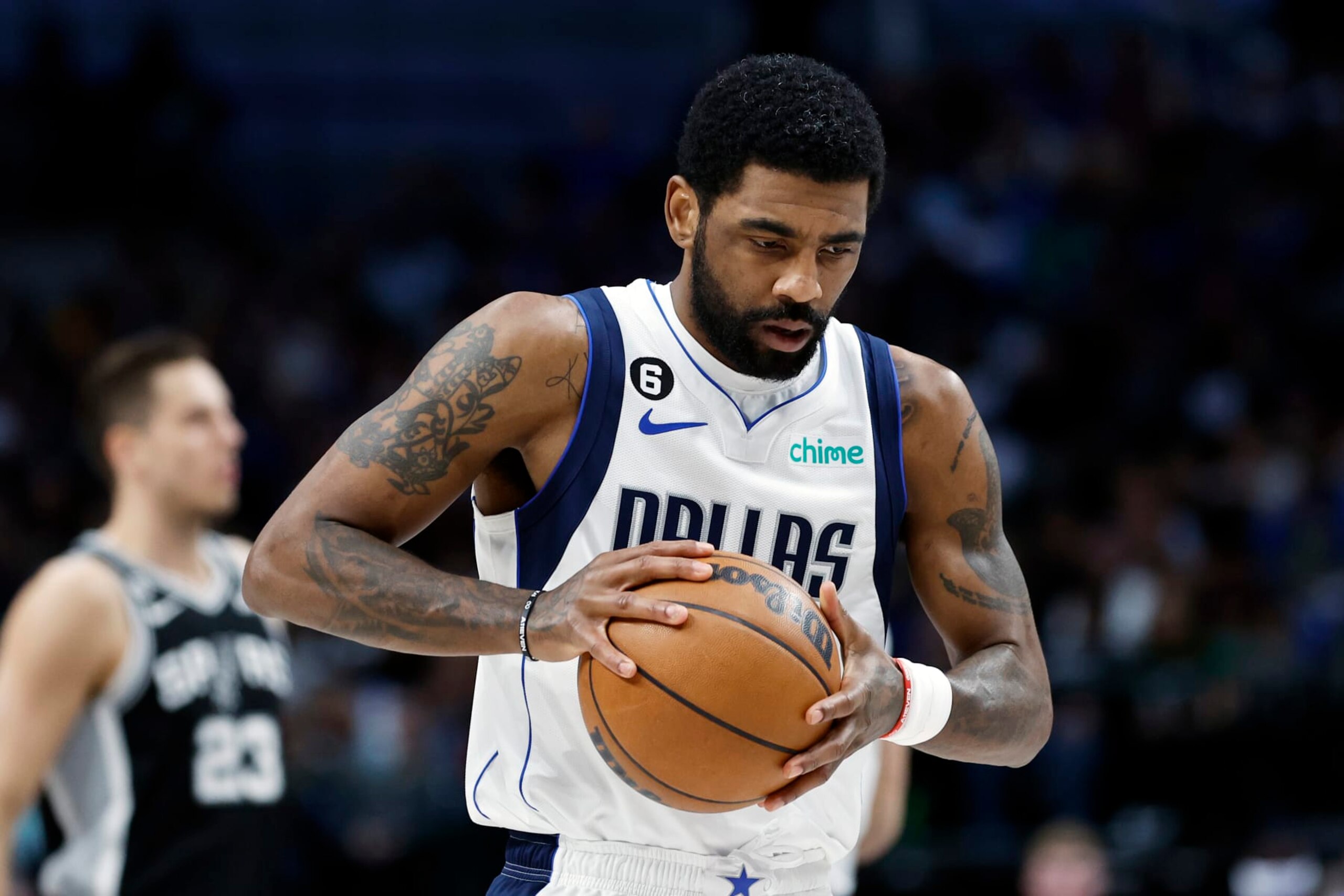 DALLAS, TEXAS - FEBRUARY 23: Kyrie Irving #2 of the Dallas Mavericks holds the ball before the game against the San Antonio Spurs at American Airlines Center on February 23, 2023 in Dallas, Texas. NOTE TO USER: User expressly acknowledges and agrees that, by downloading and or using this photograph, User is consenting to the terms and conditions of the Getty Images License Agreement. (Photo by Tim Heitman/Getty Images) (Photo by Tim Heitman/Getty Images) (Photo by Tim Heitman/Getty Images)