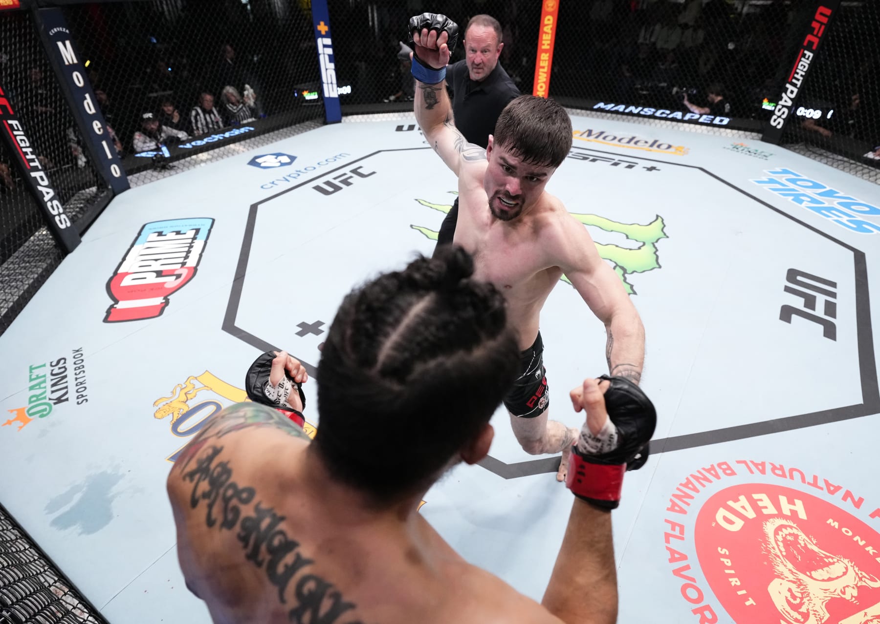Trevor Peek throws a punch at Erick Gonzalez. 