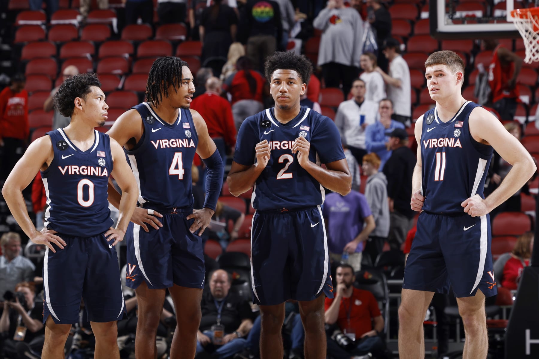 LOUISVILLE, KY - FEBRUARY 15: Virginia Cavaliers guard Kihei Clark (0), guard Armaan Franklin (4), guard Reece Beekman (2) and guard Isaac McKneely (11) look on during a college basketball game against the Louisville Cardinals on February 15, 2023 at KFC Yum! Center in Louisville, Kentucky. (Photo by Joe Robbins/Icon Sportswire via Getty Images)