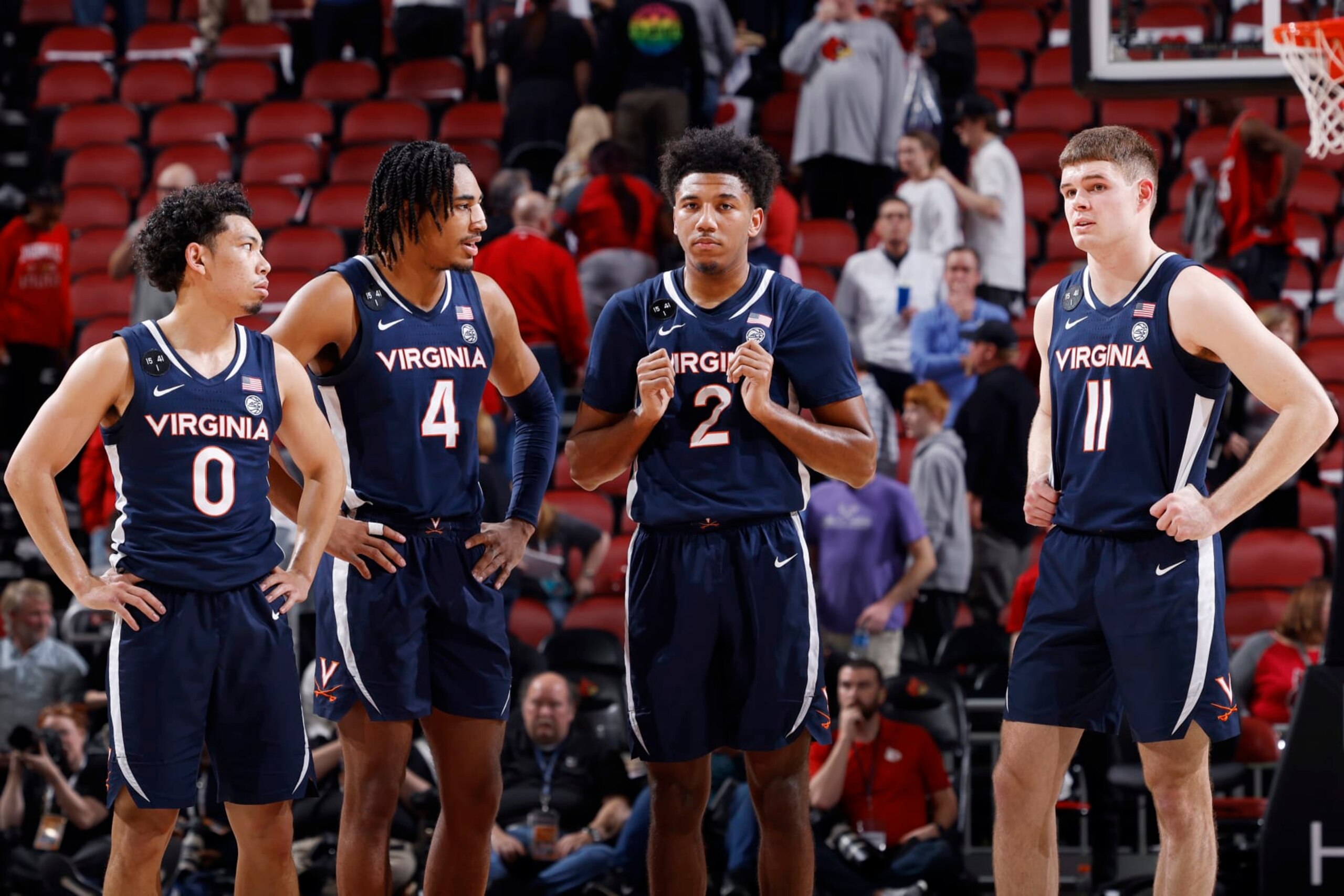 LOUISVILLE, KY - FEBRUARY 15: Virginia Cavaliers guard Kihei Clark (0), guard Armaan Franklin (4), guard Reece Beekman (2) and guard Isaac McKneely (11) look on during a college basketball game against the Louisville Cardinals on February 15, 2023 at KFC Yum! Center in Louisville, Kentucky. (Photo by Joe Robbins/Icon Sportswire via Getty Images)