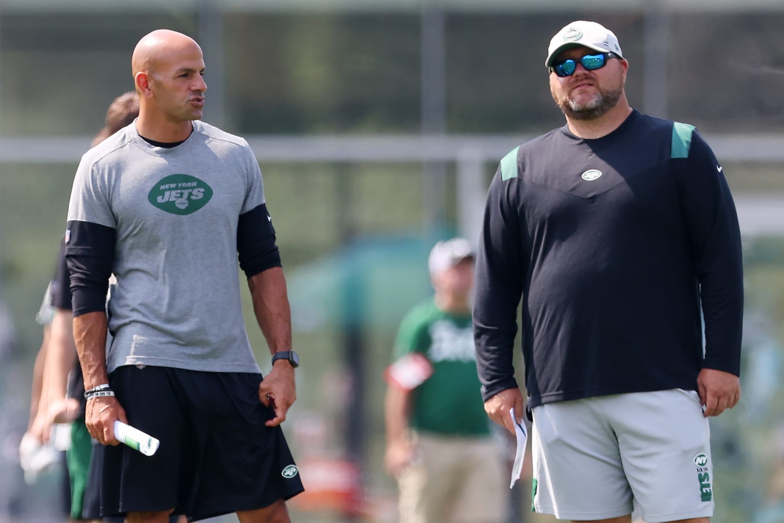 FLORHAM PARK, NJ - JULY 28: Head coach Robert Saleh, left, of the New York Jets talks with general manager Joe Douglas during morning practice at Atlantic Health Jets Training Center on July 28, 2021 in Florham Park, New Jersey. (Photo by Rich Schultz/Getty Images) FLORHAM PARK, NJ - JULY 28: Head coach Robert Saleh, left, of the New York Jets talks with general manager Joe Douglas during morning practice at Atlantic Health Jets Training Center on July 28, 2021 in Florham Park, New Jersey. (Photo by Rich Schultz/Getty Images)