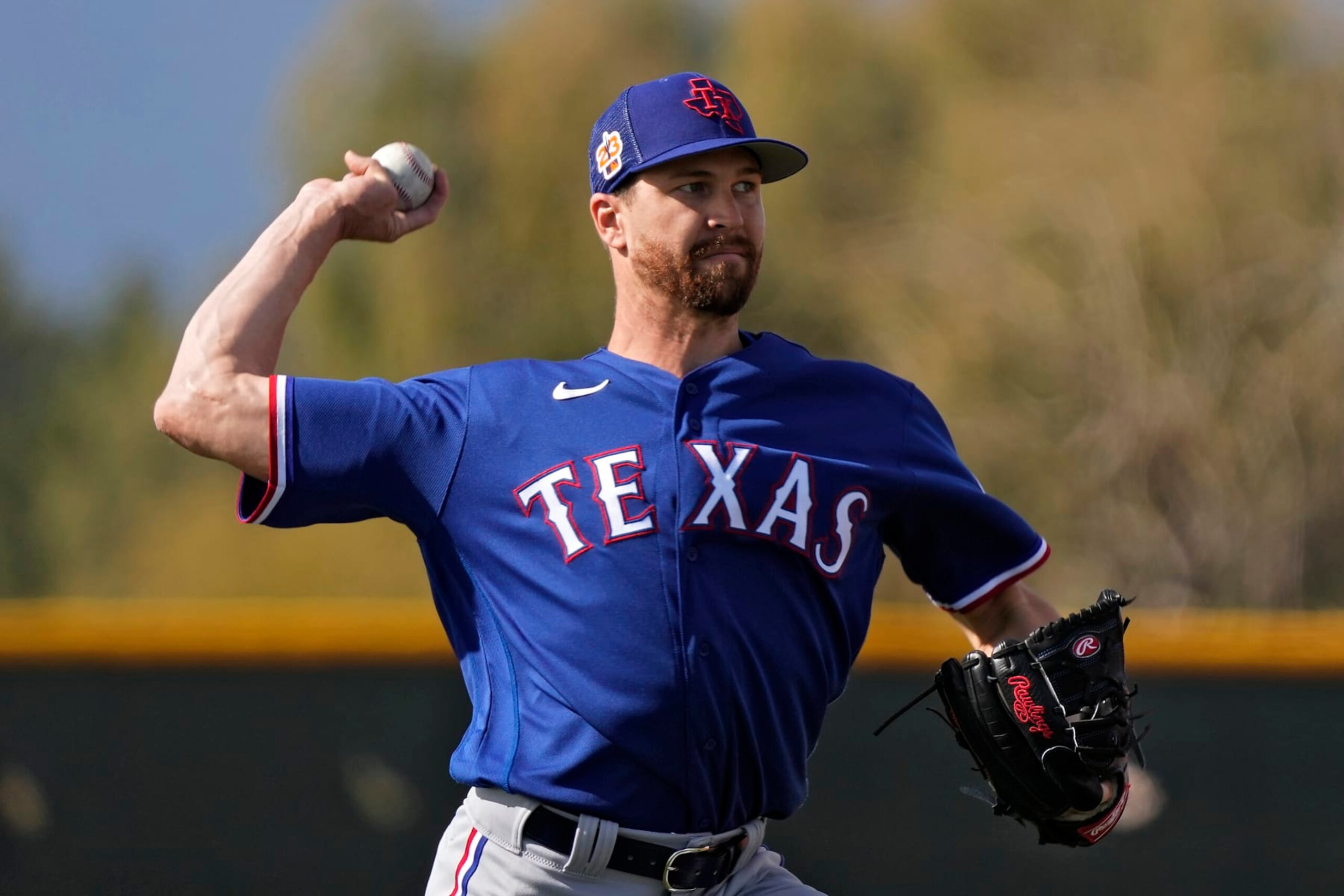 Texas Rangers pitcher Jacob deGrom throws during spring training baseball practice Sunday, Feb. 19, 2023, in Surprise, Ariz. (AP Photo/Charlie Riedel) Texas Rangers pitcher Jacob deGrom throws during spring training baseball practice Sunday, Feb. 19, 2023, in Surprise, Ariz. (AP Photo/Charlie Riedel)