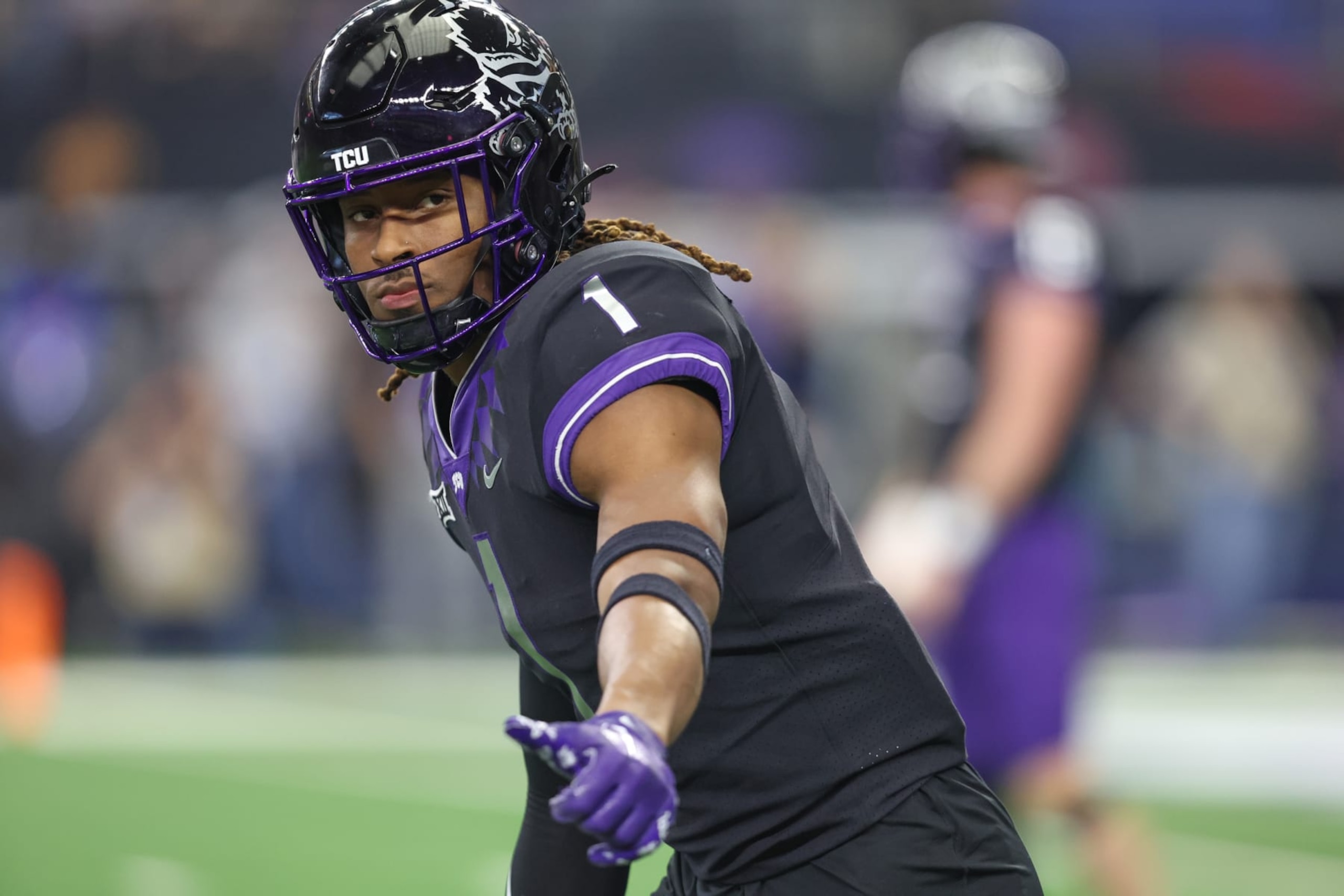 ARLINGTON, TX - DECEMBER 03: TCU Horned Frogs wide receiver Quentin Johnston (1) checks with the sideline judge during the Big 12 Championship game between TCU and Kansas State on December 3, 2022 at AT&T Stadium in Arlington, TX. (Photo by George Walker/Icon Sportswire via Getty Images)