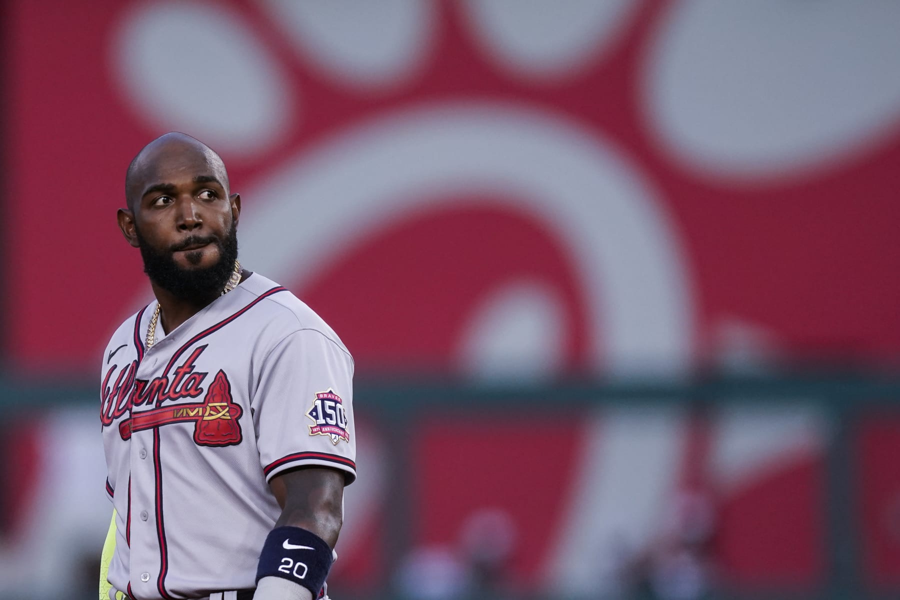 Atlanta Braves' Marcell Ozuna stands on the field during the inning of baseball game against the Washington Nationals at Nationals Park, Tuesday, May 4, 2021, in Washington. (AP Photo/Alex Brandon)