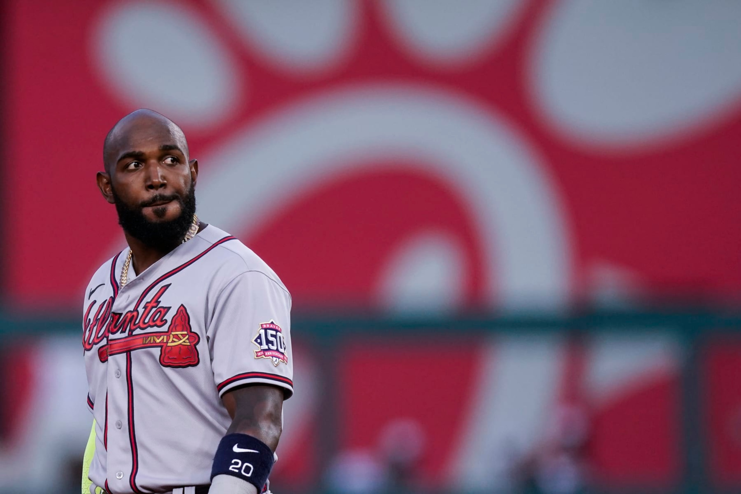 Atlanta Braves' Marcell Ozuna stands on the field during the inning of baseball game against the Washington Nationals at Nationals Park, Tuesday, May 4, 2021, in Washington. (AP Photo/Alex Brandon)
