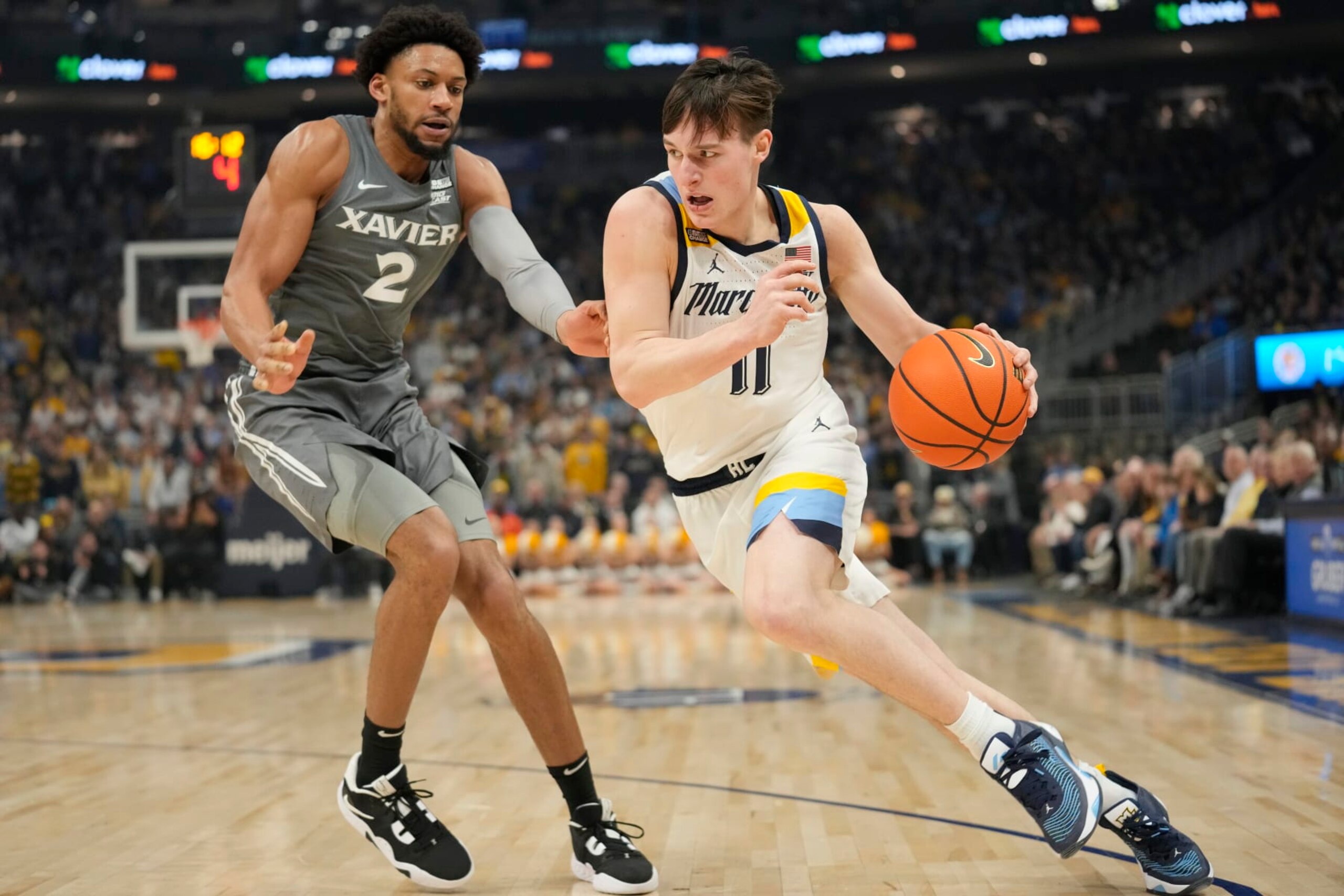 Marquette's Tyler Kolek and Xavier's Jerome Hunter Marquette's Tyler Kolek and Xavier's Jerome Hunter